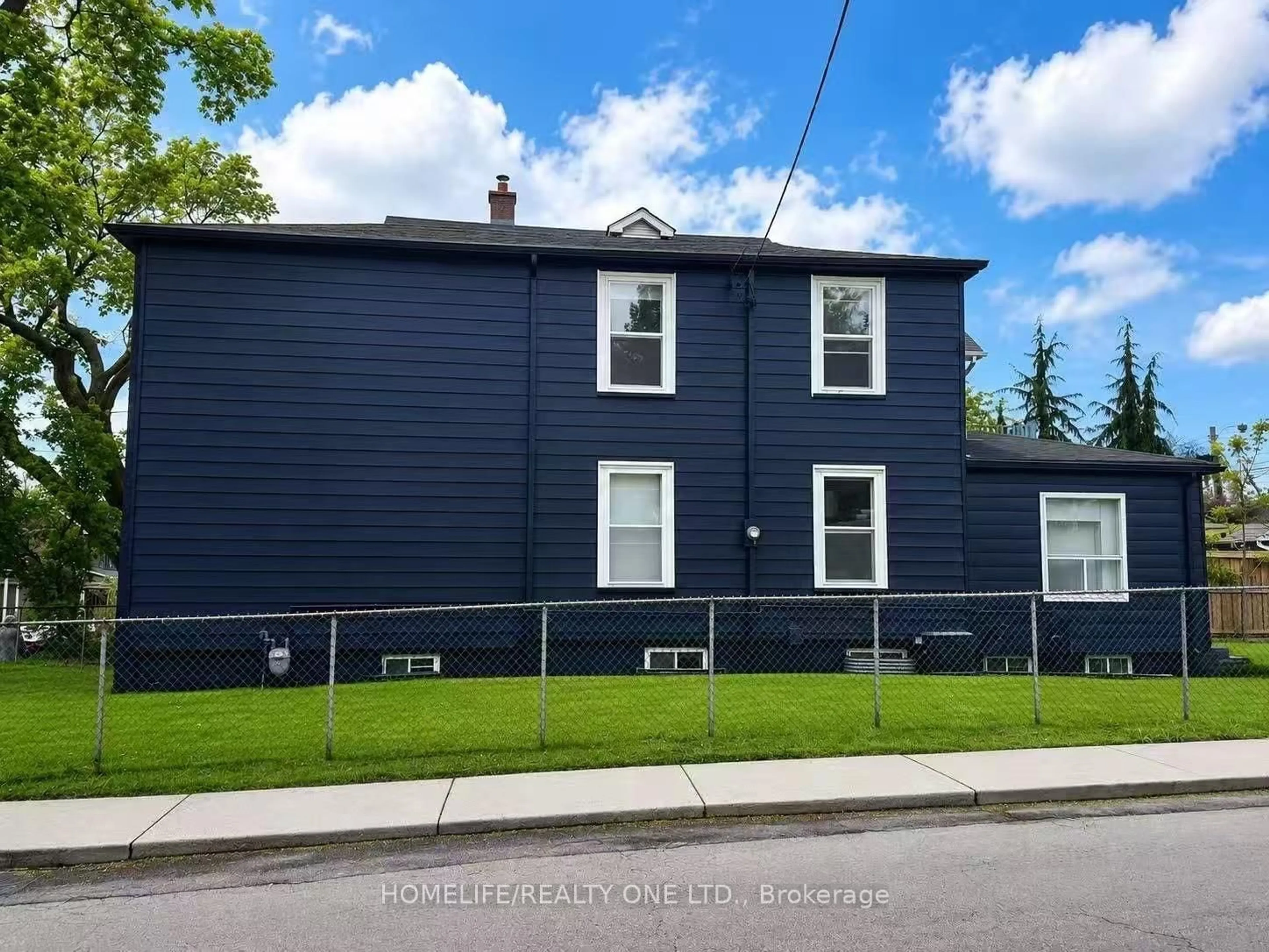 Home with vinyl exterior material, street for 104 Benson Ave, Toronto Ontario M6G 2J1