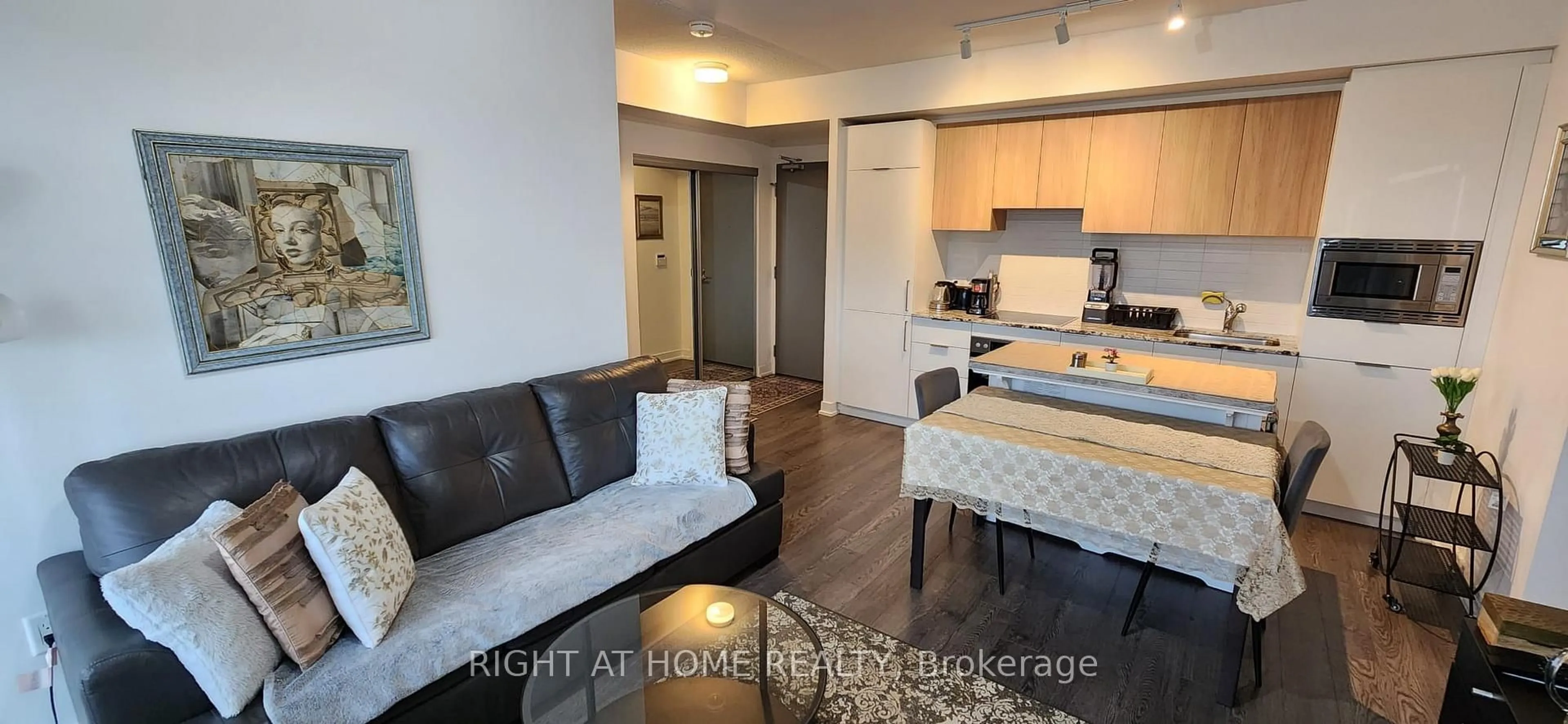 Living room with furniture, unknown for 20 O'Neill Rd #527, Toronto Ontario M3C 0R2