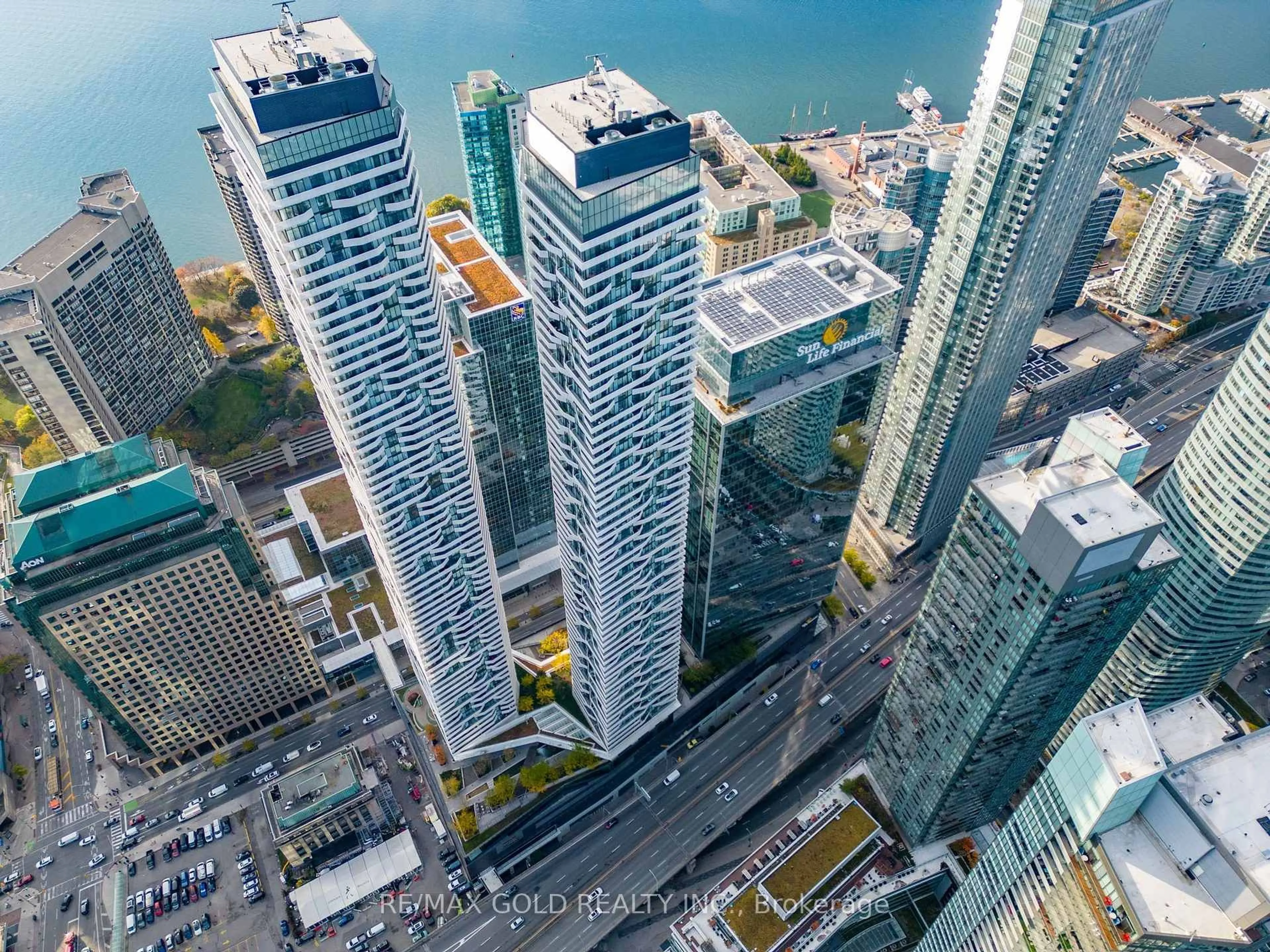 A pic from outside/outdoor area/front of a property/back of a property/a pic from drone, city buildings view from balcony for 100 Harbour St #1202, Toronto Ontario M5J 0B5