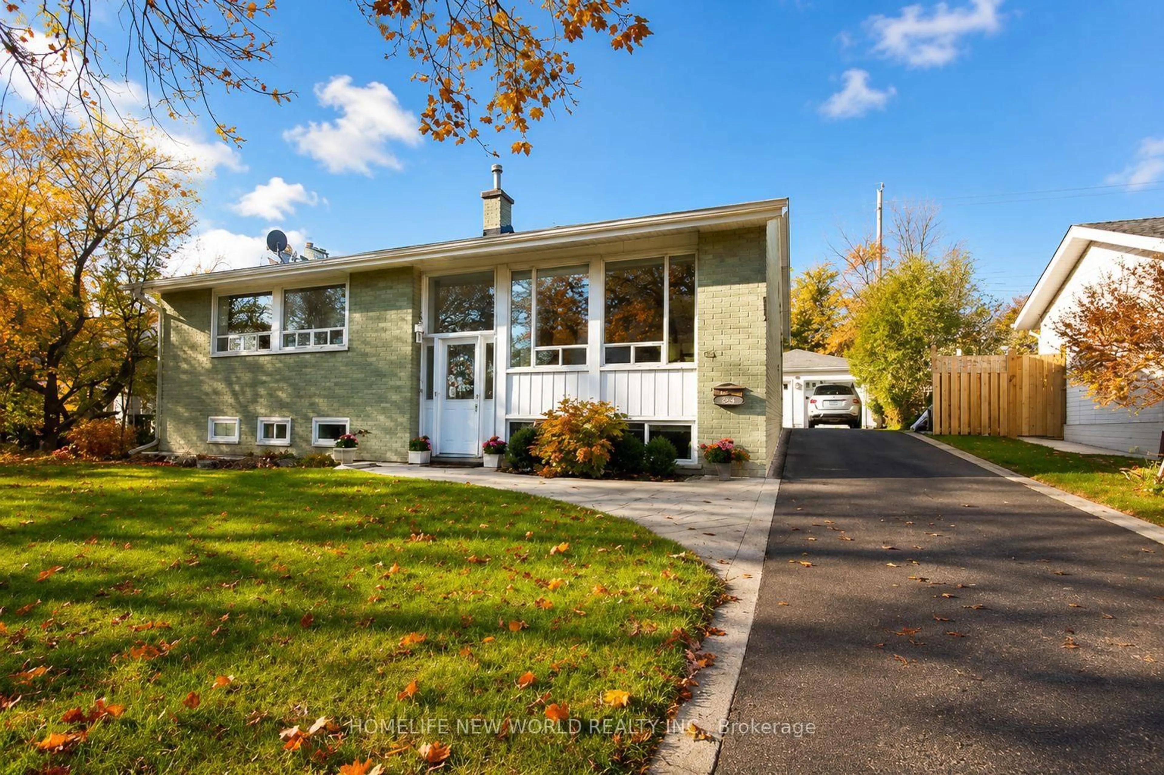 Home with vinyl exterior material, street for 54 Southwell Dr, Toronto Ontario M3B 2N9