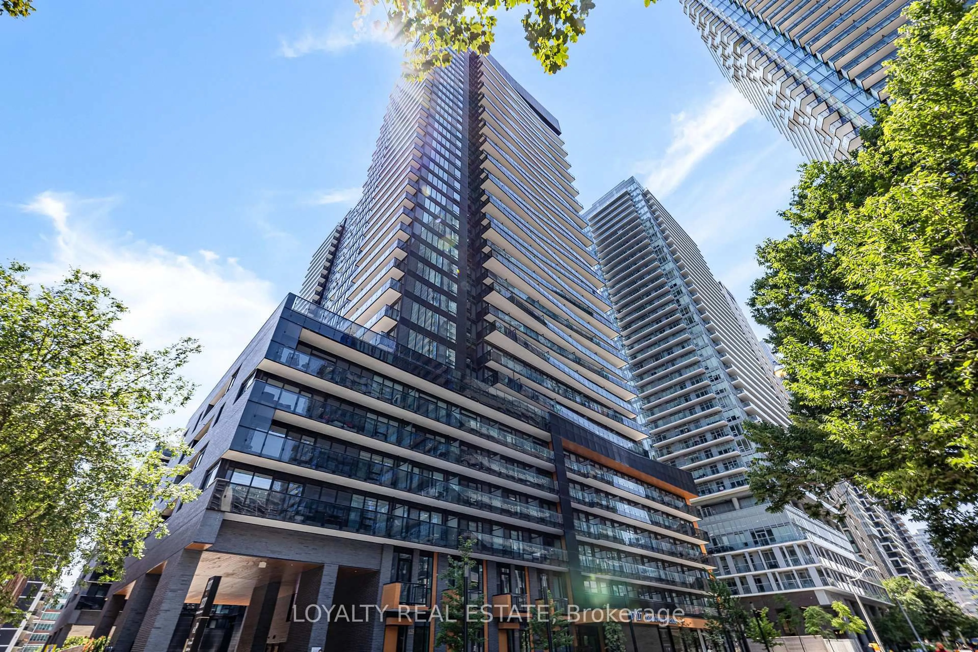 A pic from outside/outdoor area/front of a property/back of a property/a pic from drone, city buildings view from balcony for 117 Broadway Ave #211, Toronto Ontario M4P 1V3