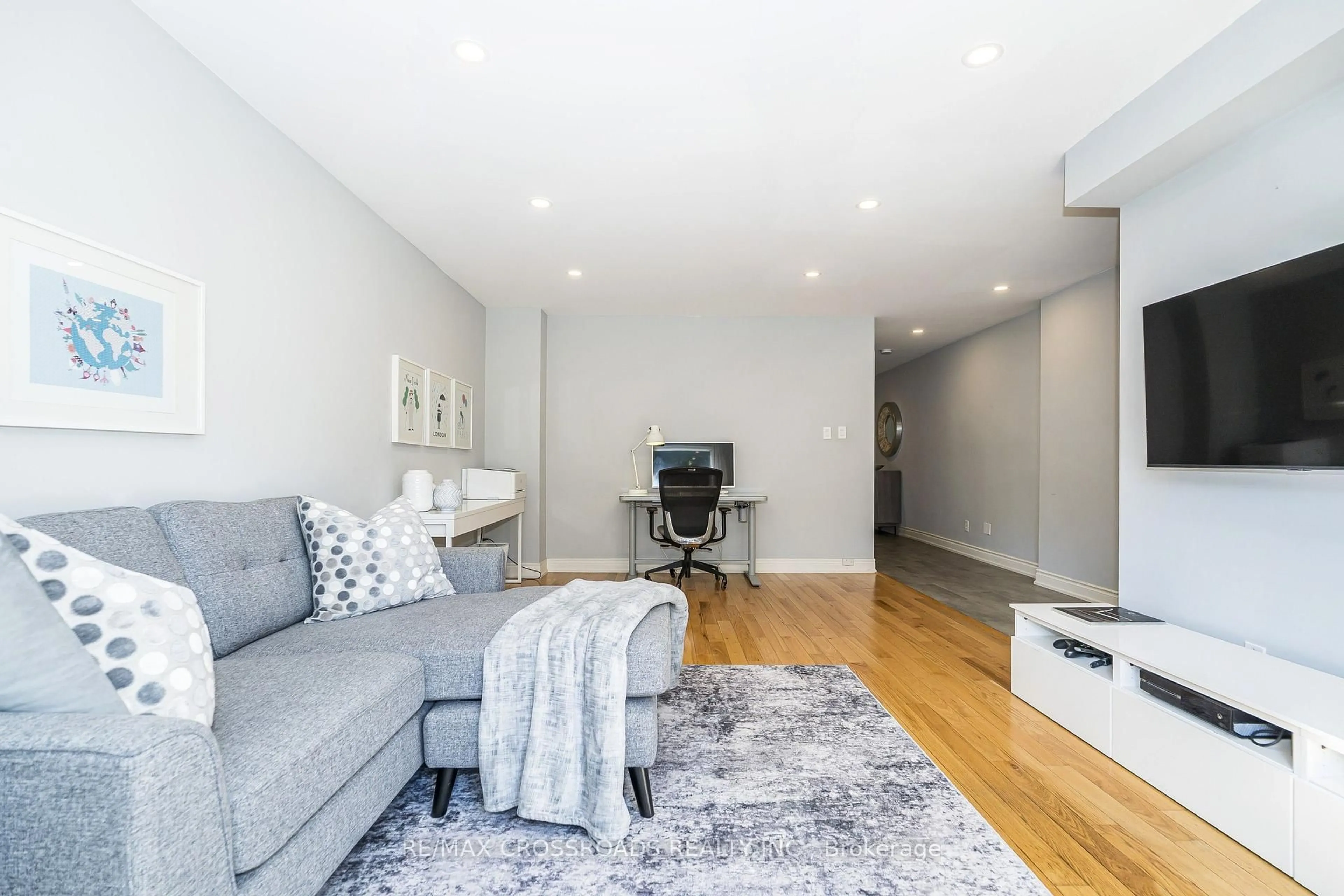 Living room with furniture, wood/laminate floor for 21A Brian Dr, Toronto Ontario M2J 3X8