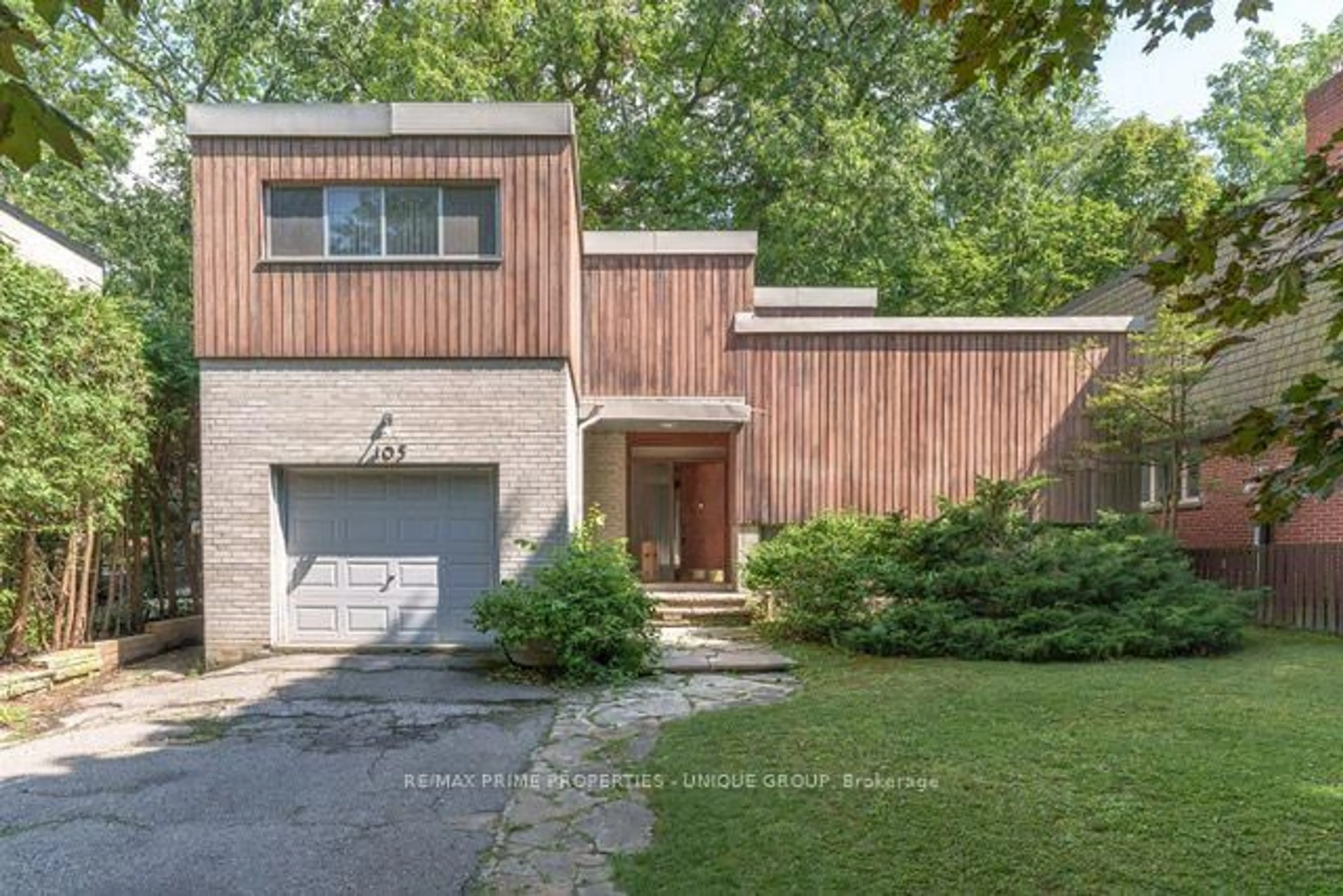 Home with brick exterior material, street for 105 Park Rd, Toronto Ontario M4W 2N8