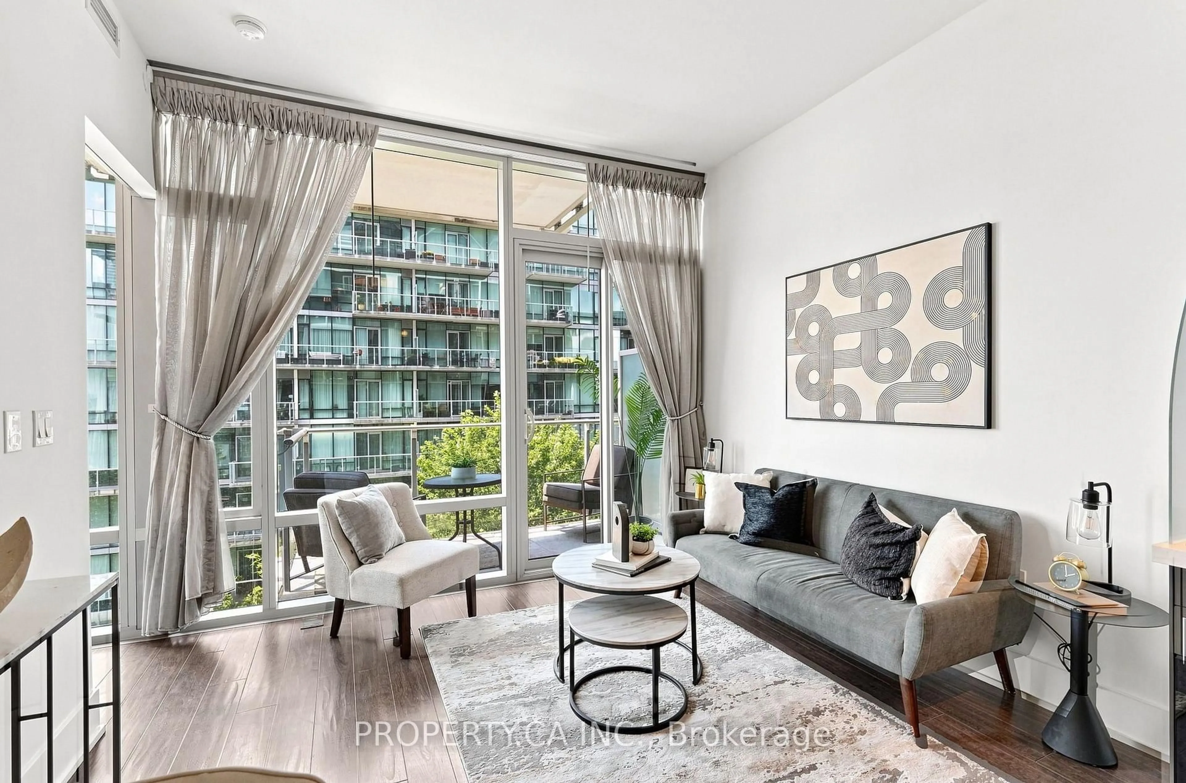 Living room with furniture, unknown for 39 Queens Quay #625, Toronto Ontario M5E 0A5