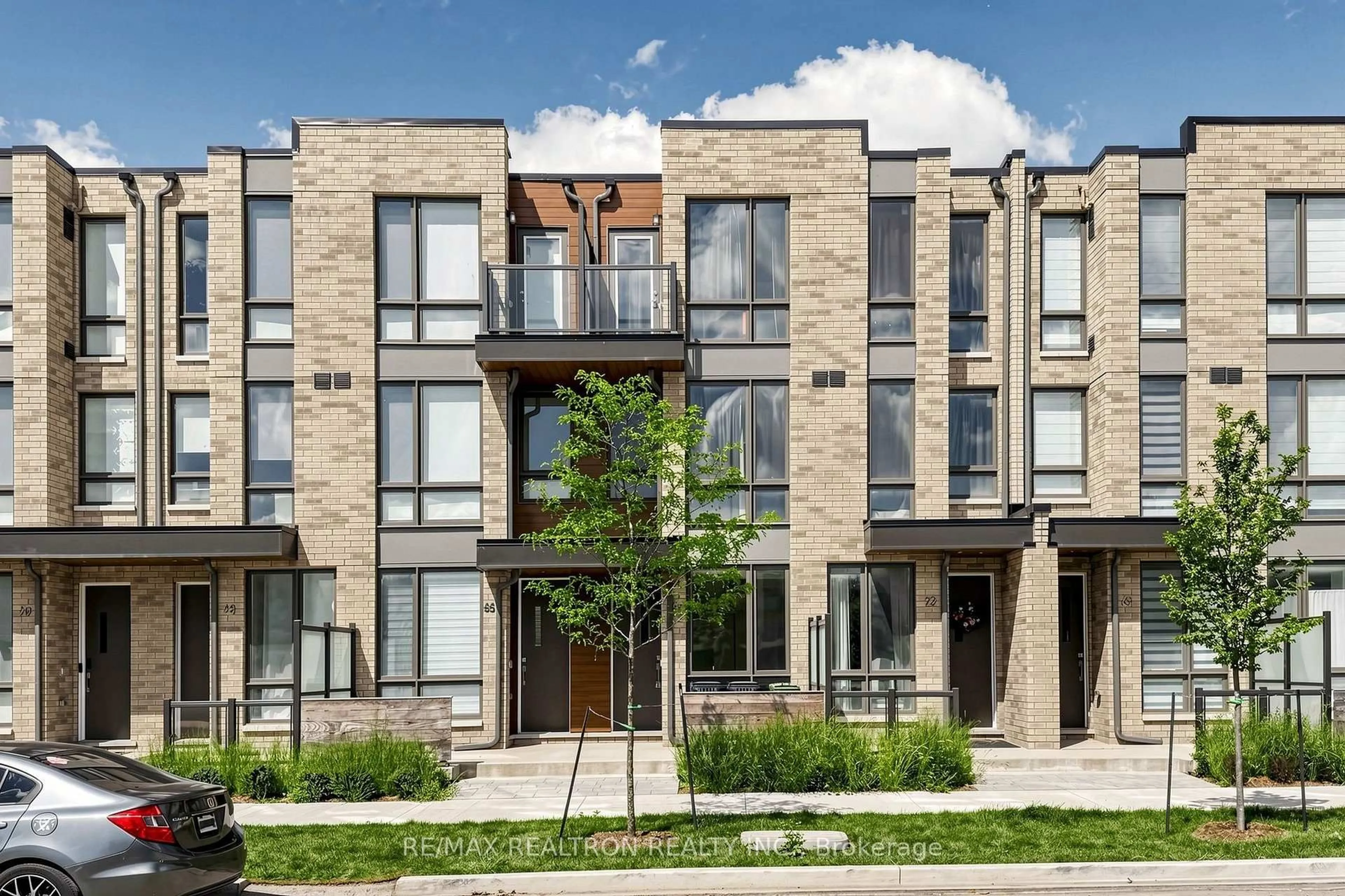 Home with brick exterior material, street for 64 Turtle Island Rd, Toronto Ontario M6A 2M5