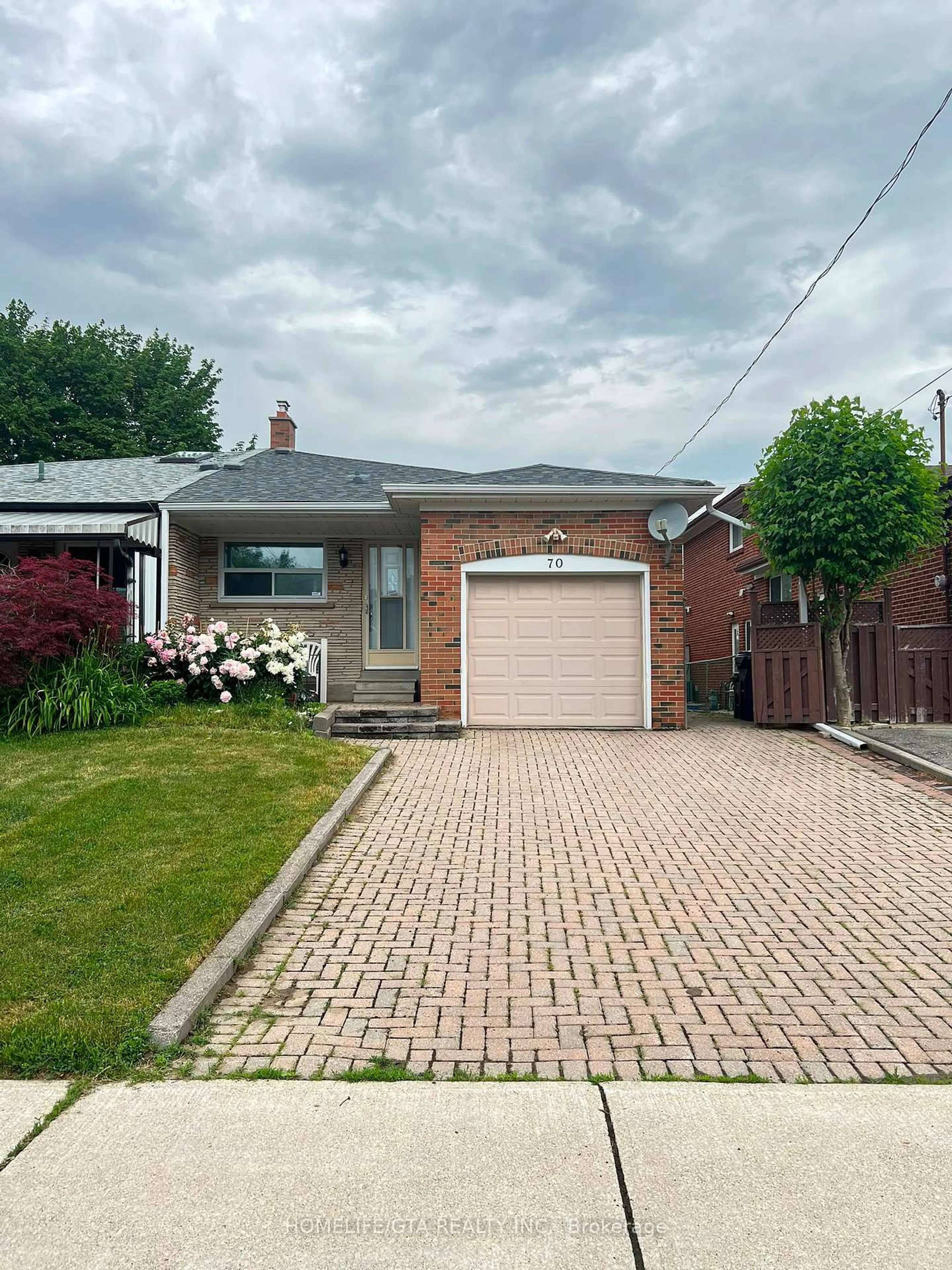 Home with brick exterior material, street for 70 Tanjoe Cres, Toronto Ontario M2M 1P7