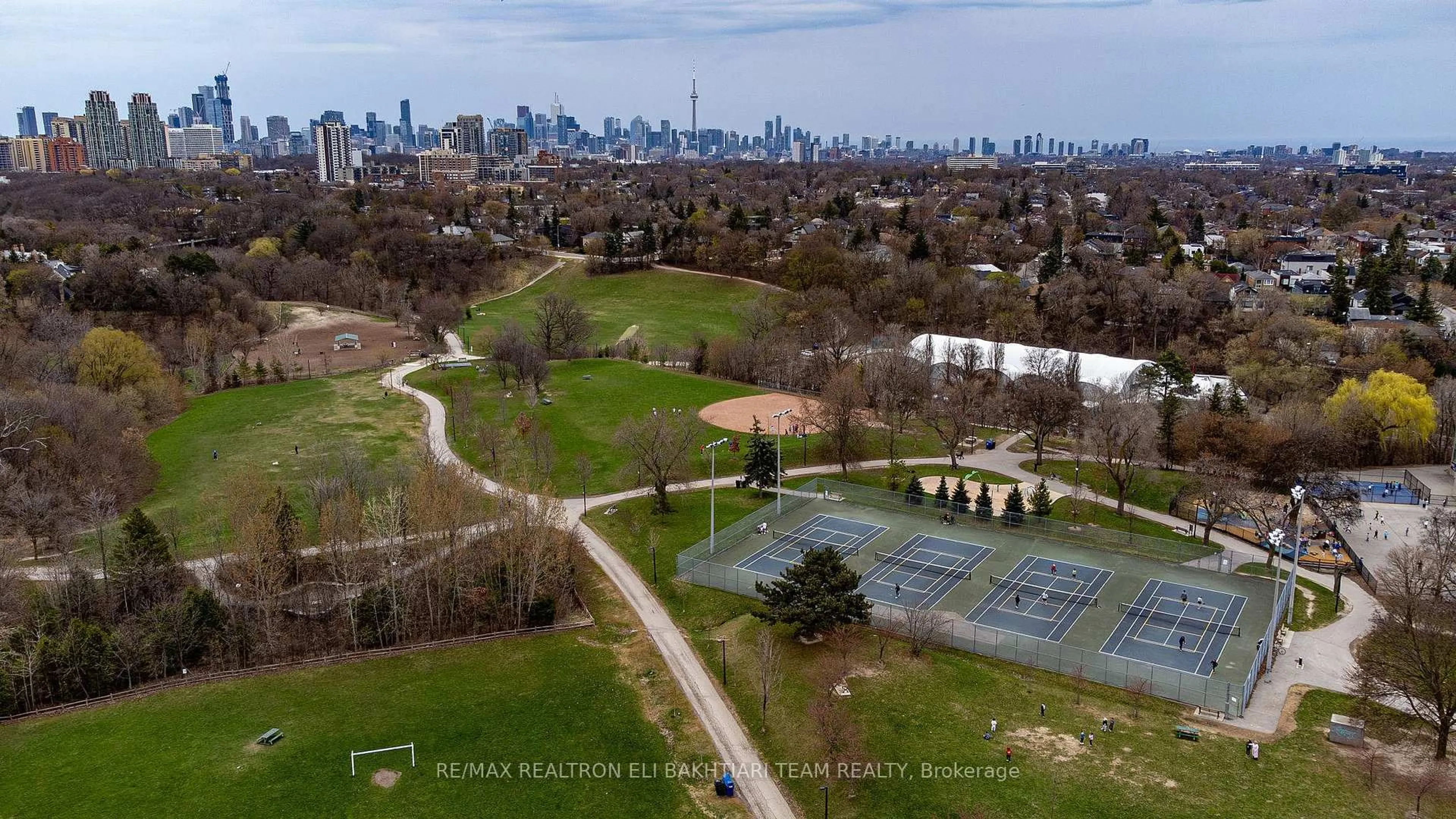 A pic from outside/outdoor area/front of a property/back of a property/a pic from drone, city buildings view from balcony for 233 Robina Ave, Toronto Ontario M6C 3Y9