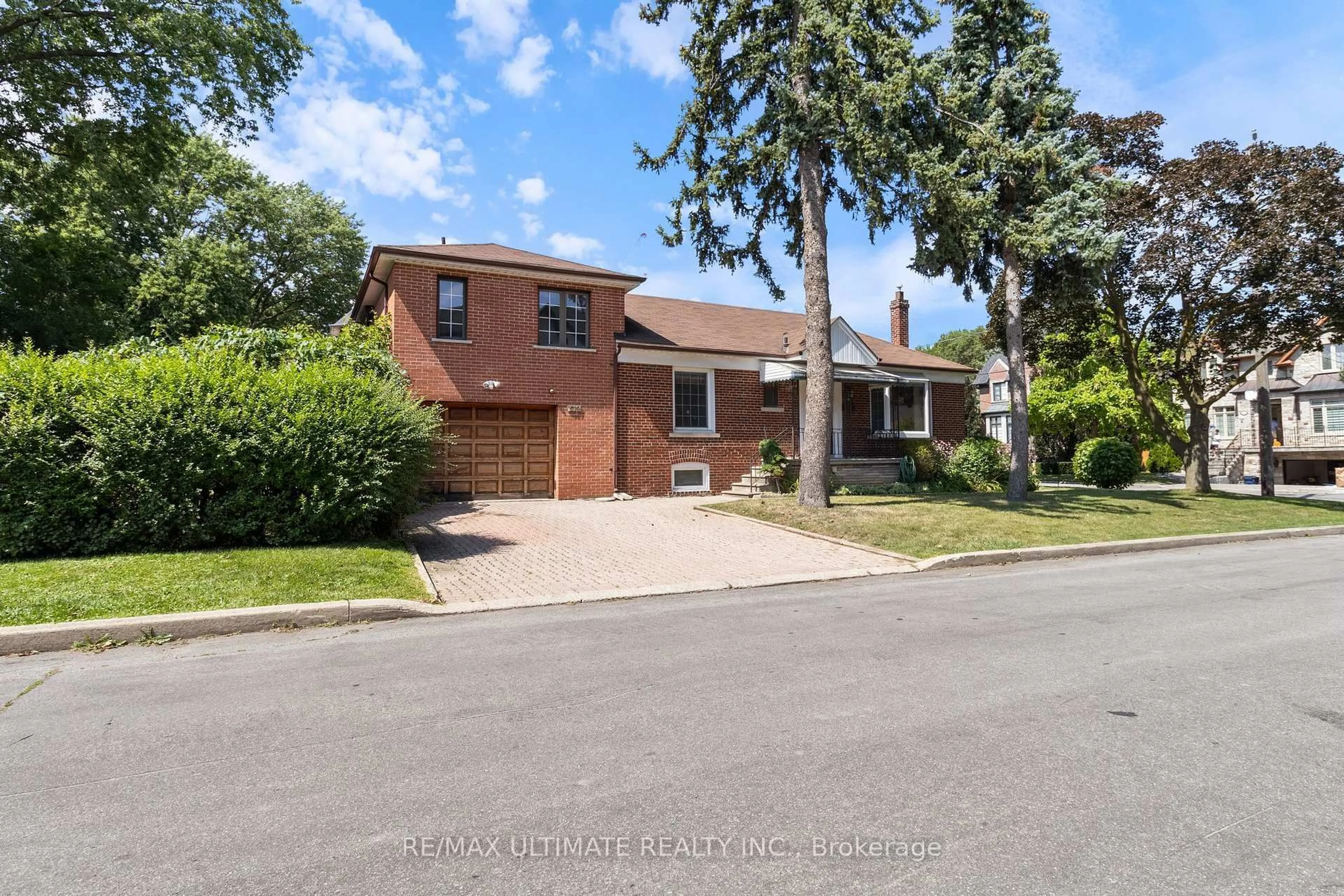 Home with brick exterior material, street for 519 Douglas Ave, Toronto Ontario M5M 1H7