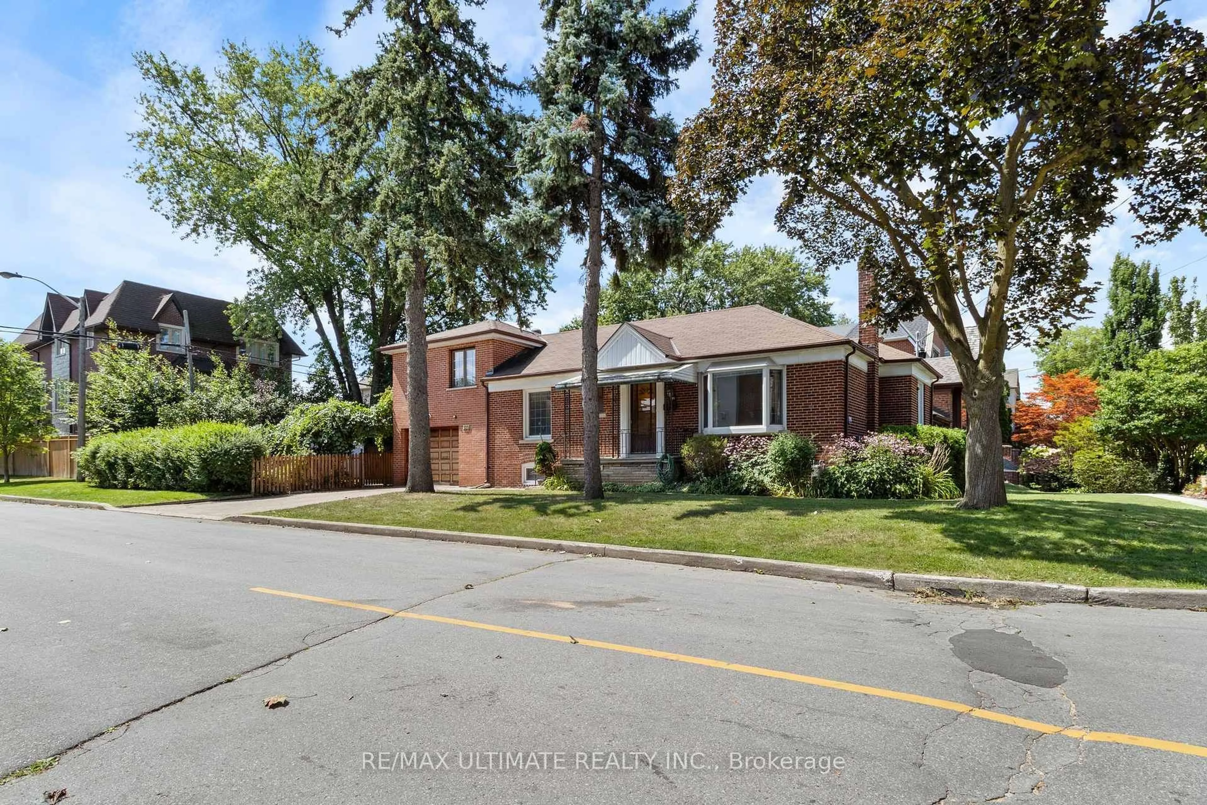 Home with brick exterior material, street for 519 Douglas Ave, Toronto Ontario M5M 1H7