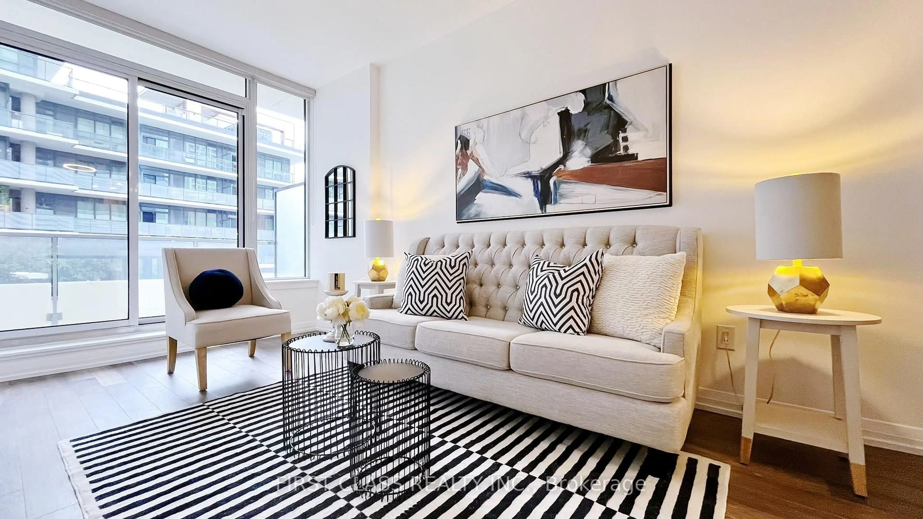 Living room with furniture, carpet floor for 75 Canterbury Pl #208, Toronto Ontario M2N 0L2