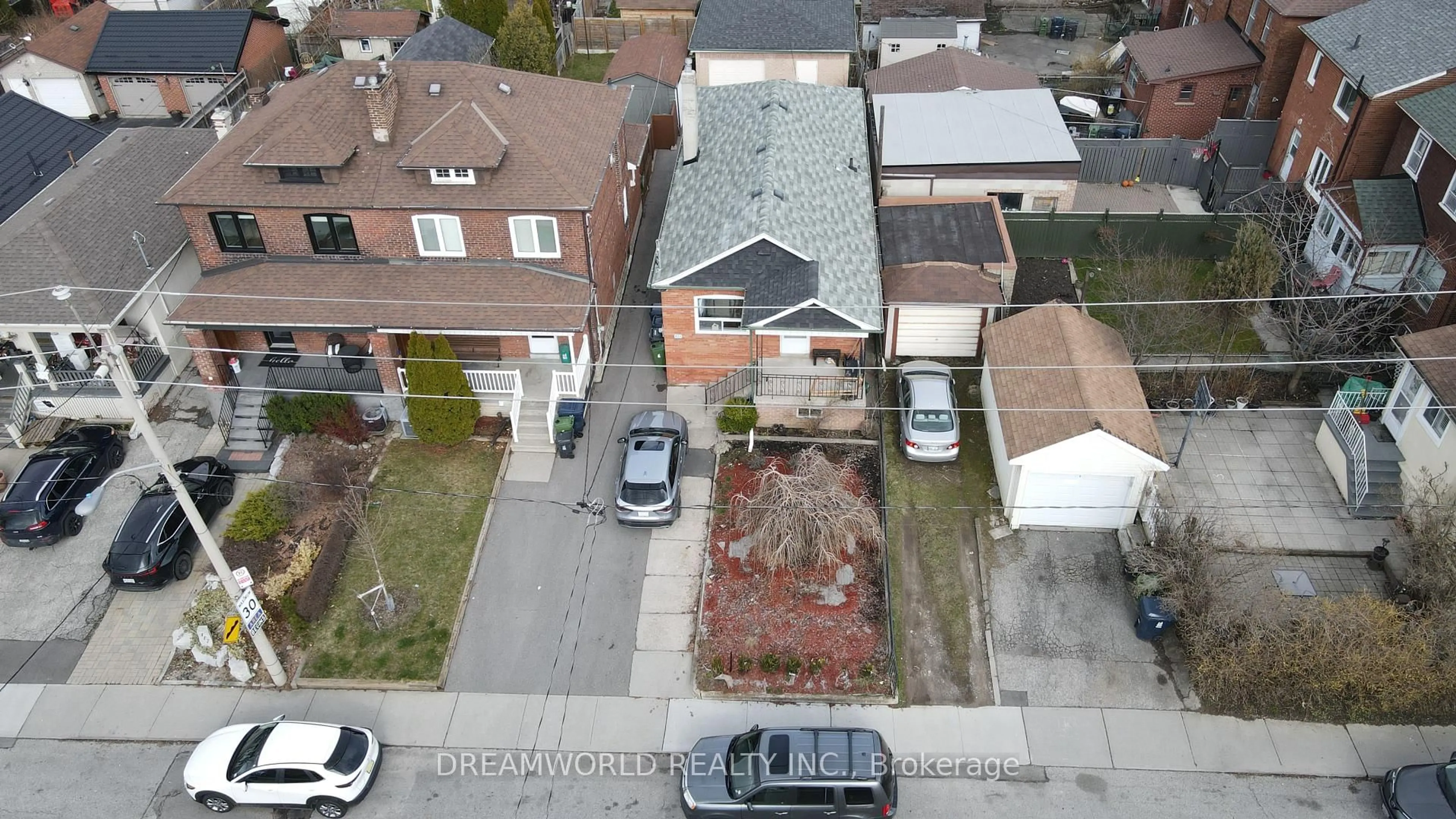 A pic from outside/outdoor area/front of a property/back of a property/a pic from drone, street for 403 Northcliffe Blvd, Toronto Ontario M6E 3L3