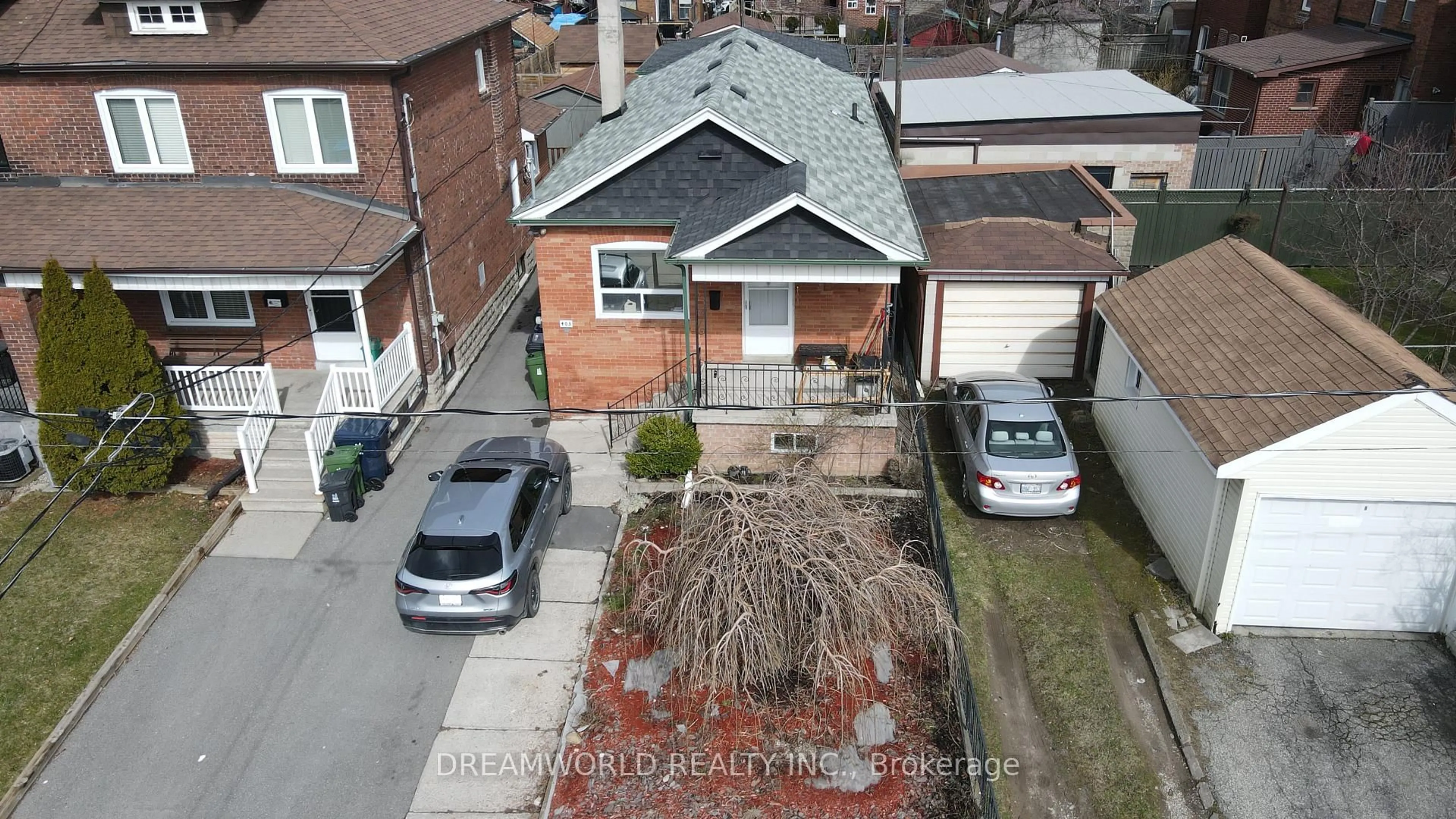 A pic from outside/outdoor area/front of a property/back of a property/a pic from drone, street for 403 Northcliffe Blvd, Toronto Ontario M6E 3L3