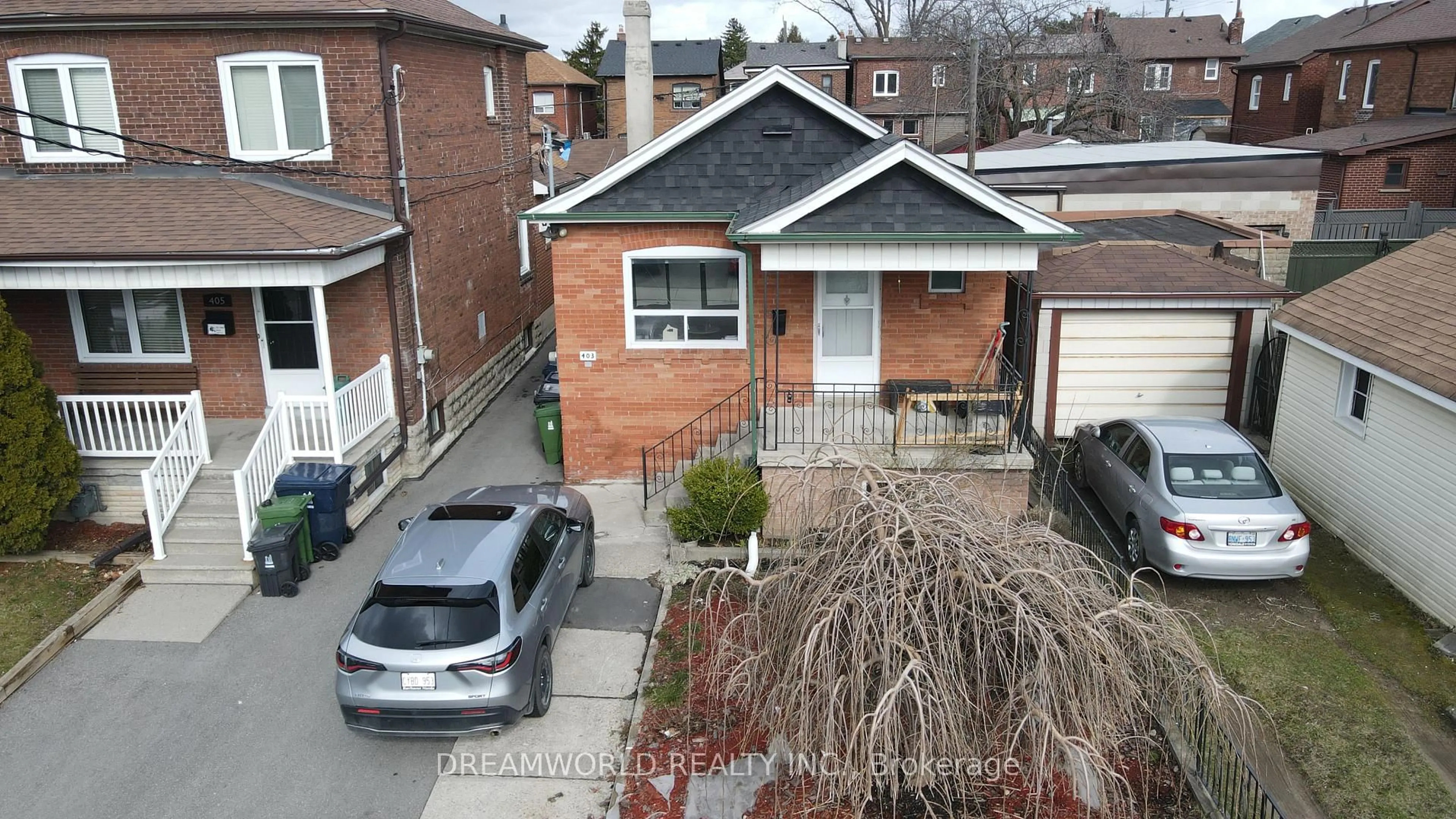 A pic from outside/outdoor area/front of a property/back of a property/a pic from drone, street for 403 Northcliffe Blvd, Toronto Ontario M6E 3L3
