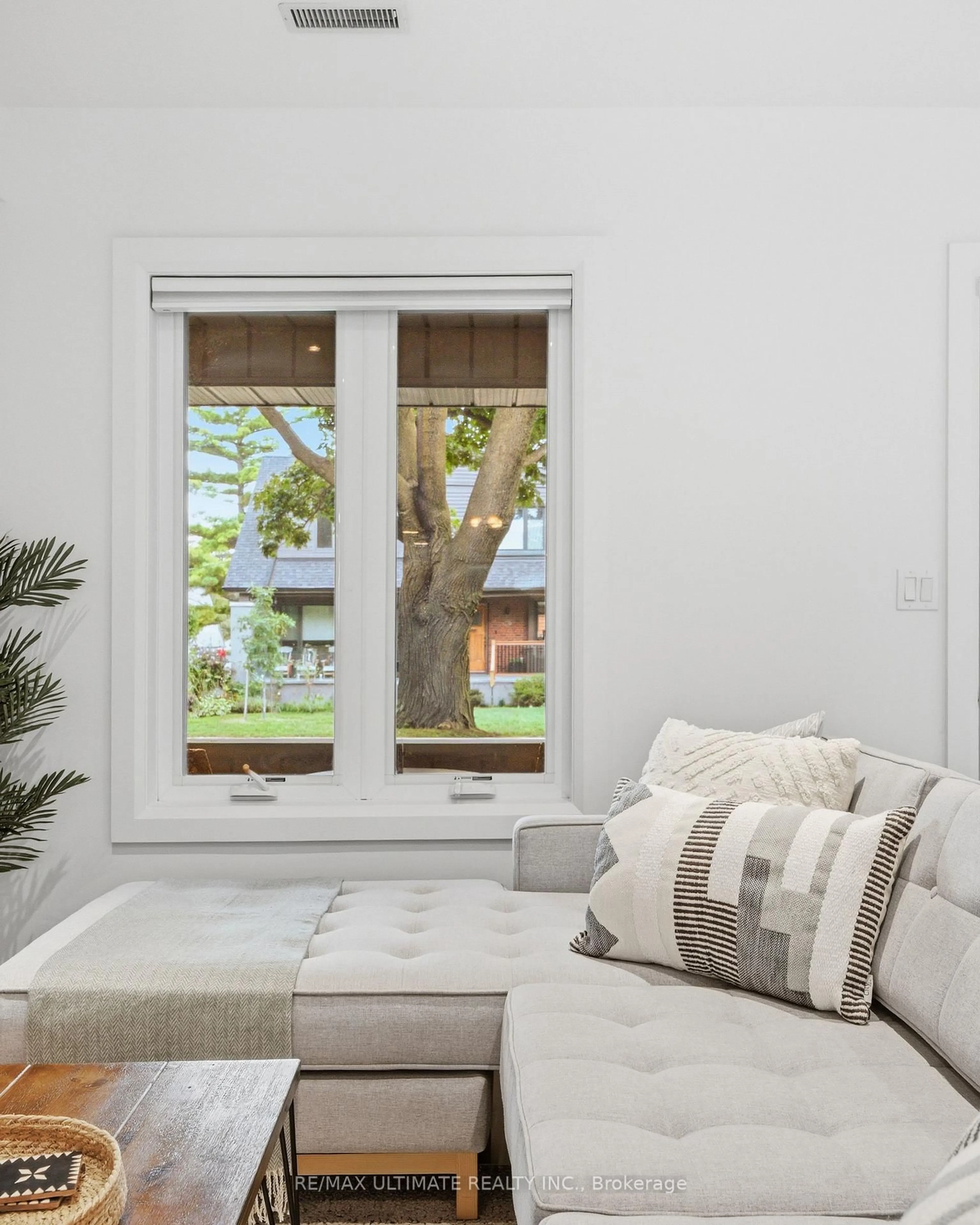 Living room with furniture, wood/laminate floor for 305 Winona Dr, Toronto Ontario M6C 3S8