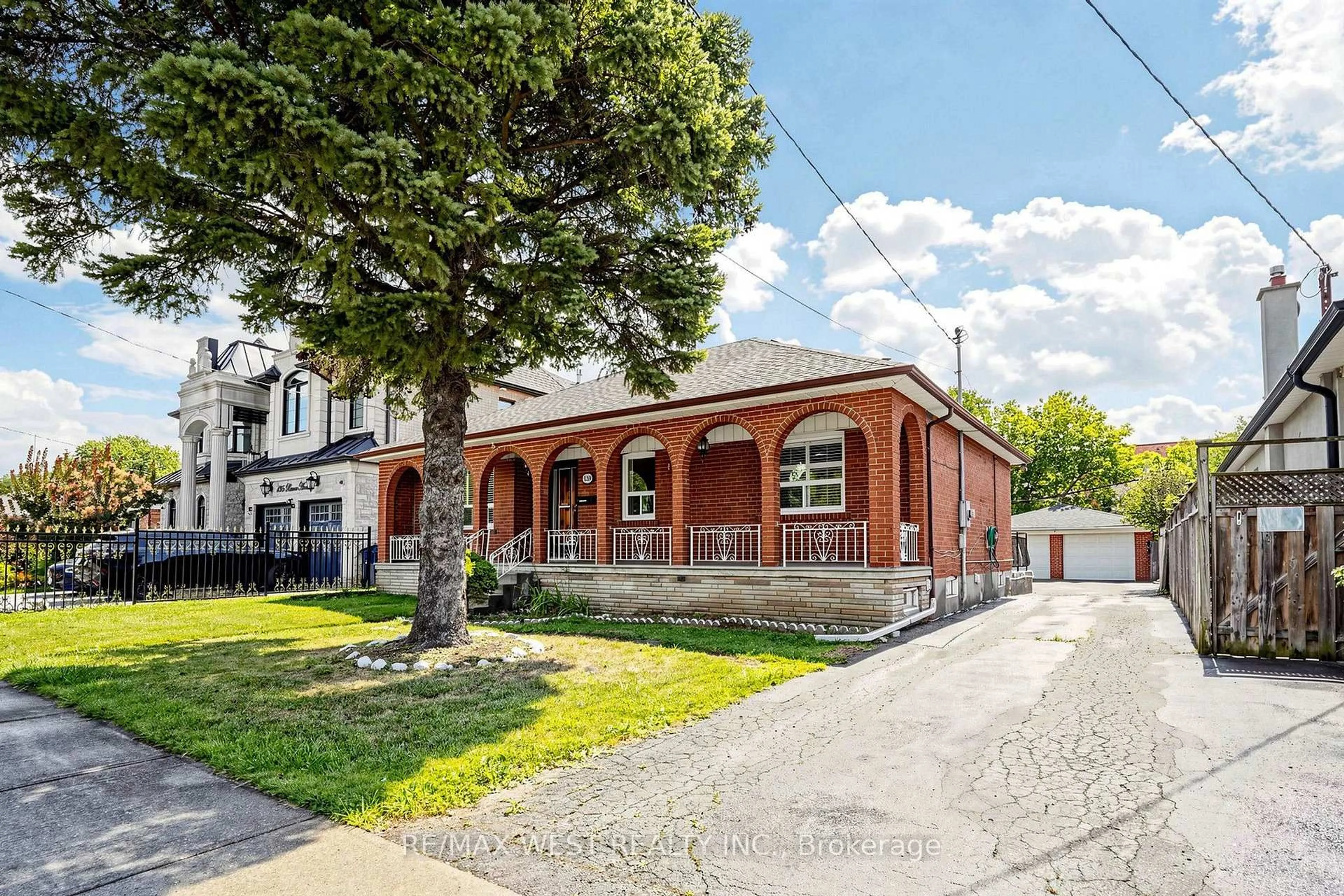 Home with brick exterior material, street for 139 Ranee Ave, Toronto Ontario M6A 1N3