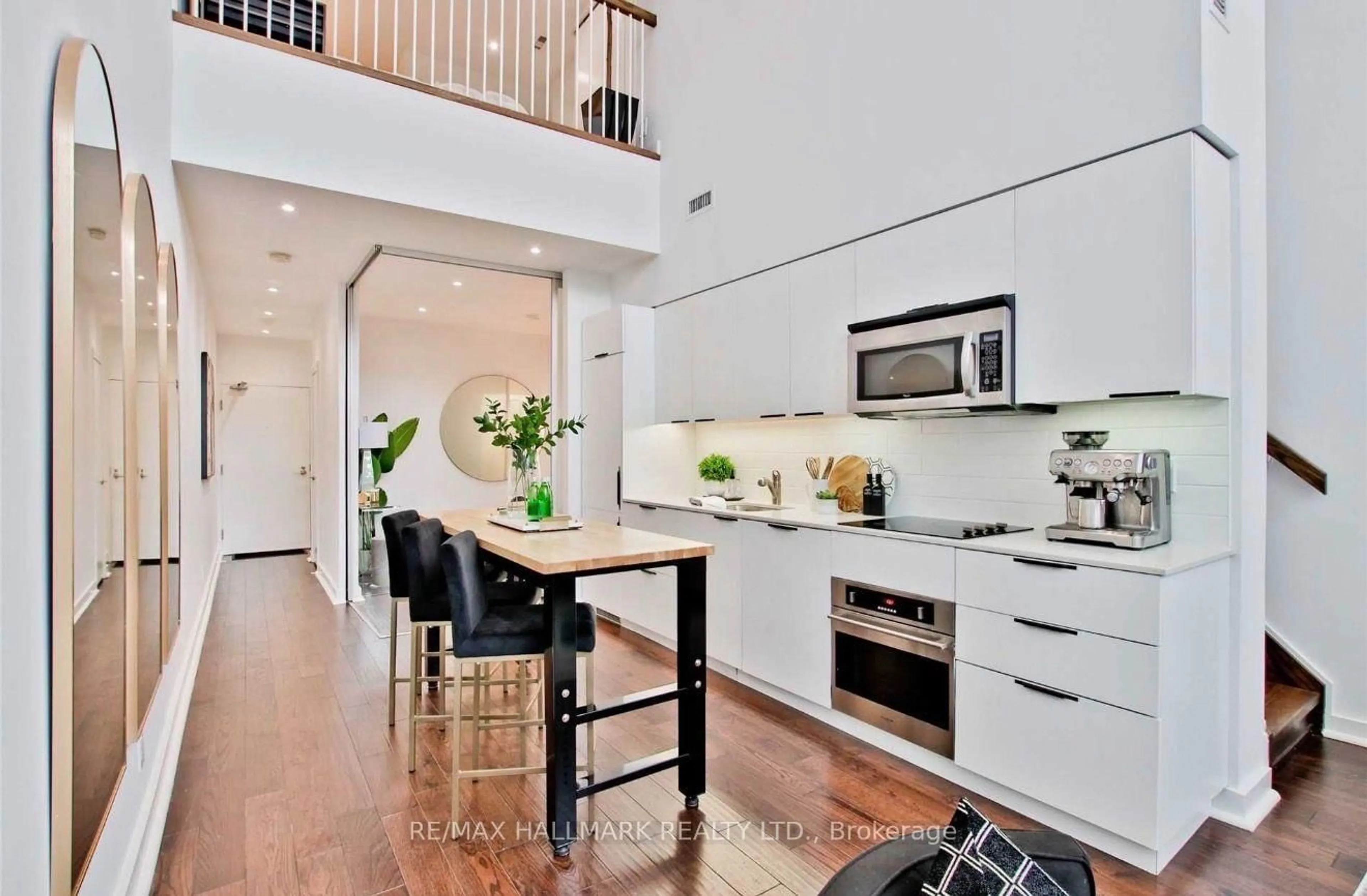 Open concept kitchen, wood/laminate floor for 5 Hanna Ave #108, Toronto Ontario M6K 0B3