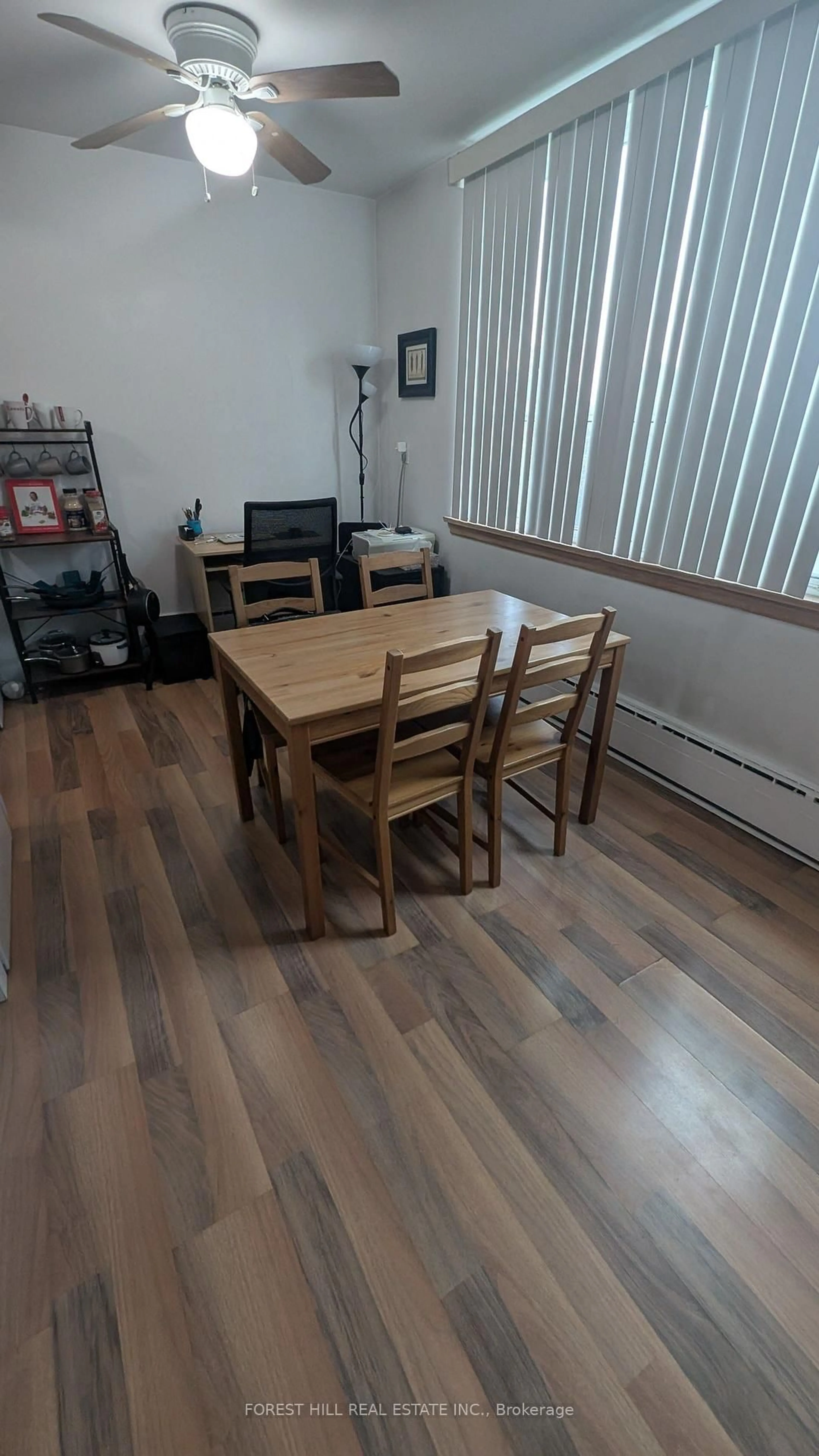 Dining room, wood/laminate floor for 55 Neptune Dr #305, Toronto Ontario M6A 1X2