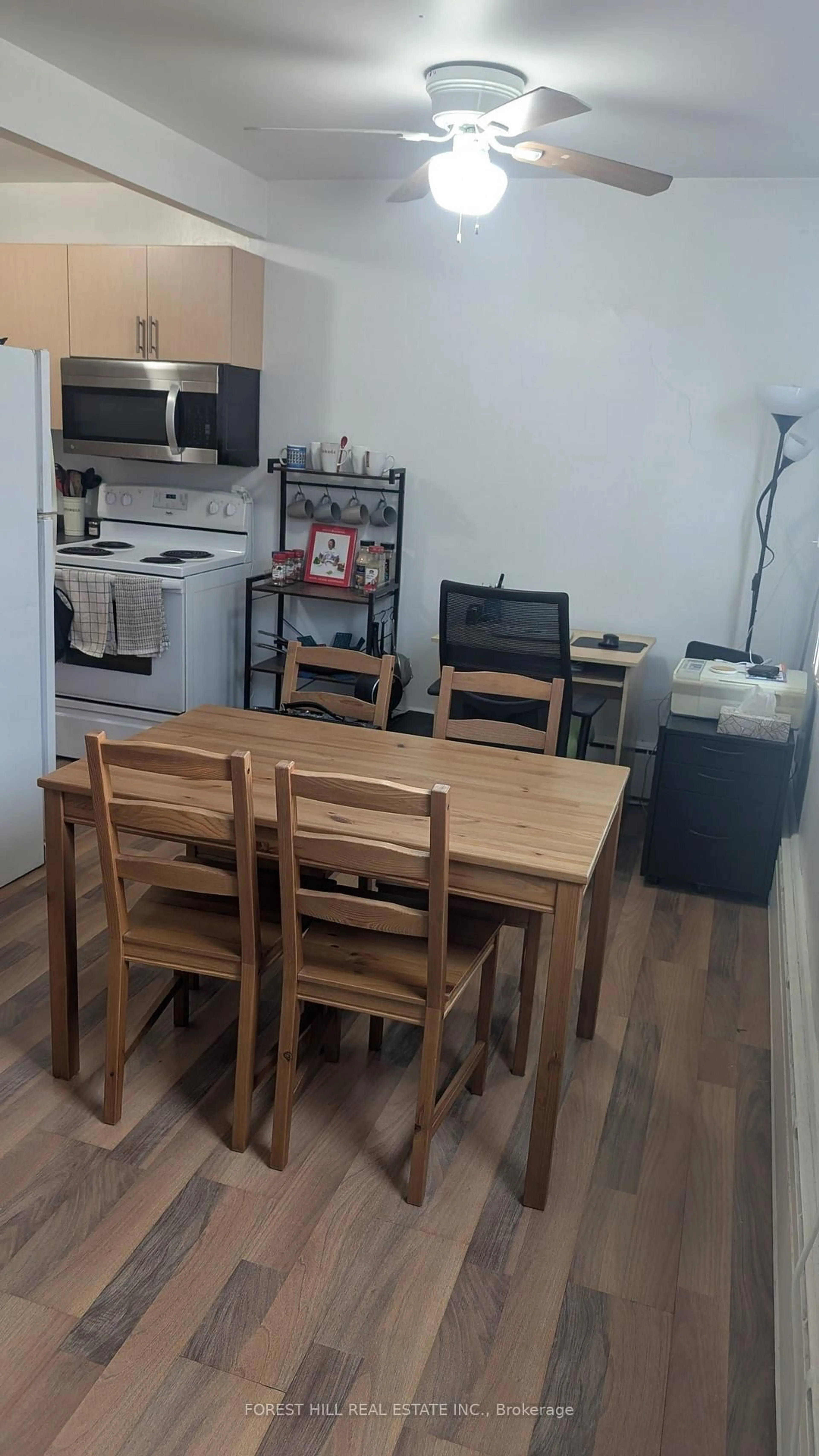 Standard kitchen, wood/laminate floor for 55 Neptune Dr #305, Toronto Ontario M6A 1X2