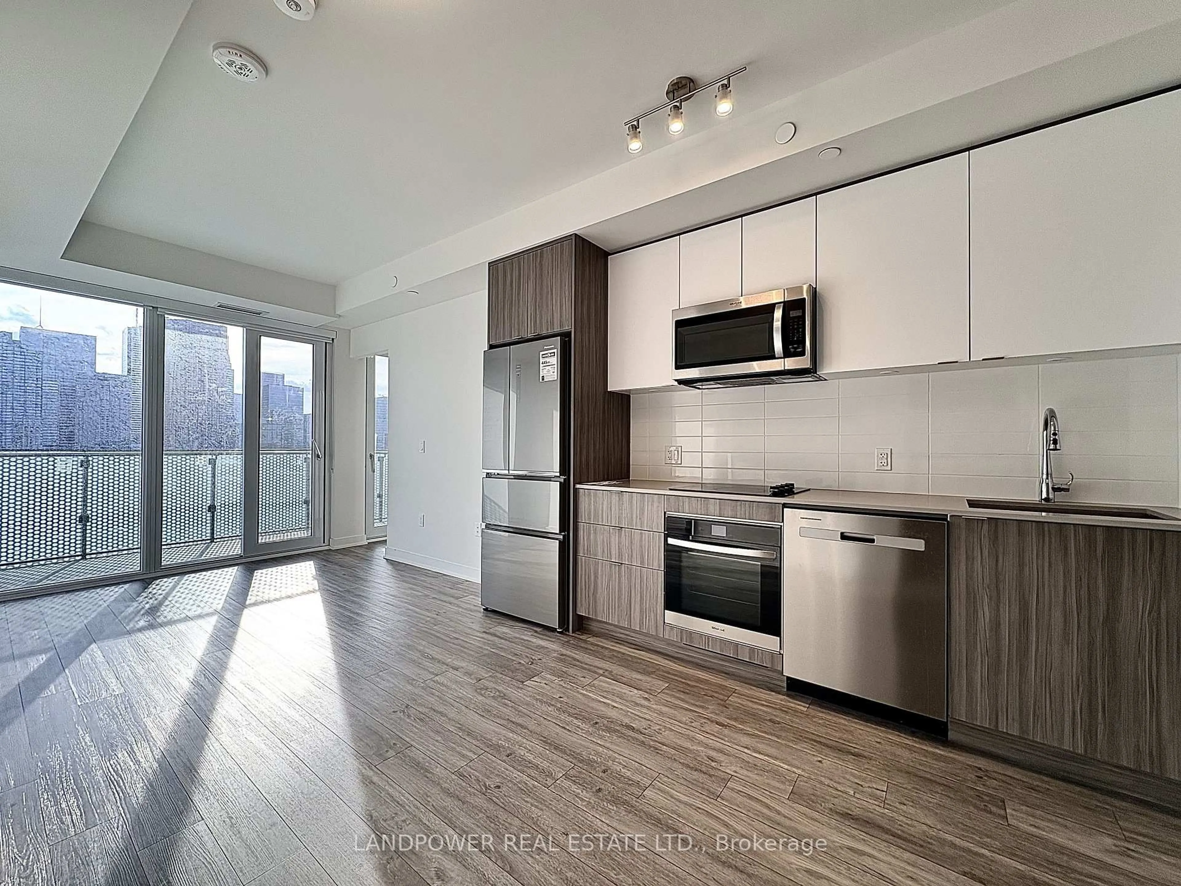 Open concept kitchen, wood/laminate floor for 135 Lower Sherbourne St #2832 W, Toronto Ontario M5A 1Y4