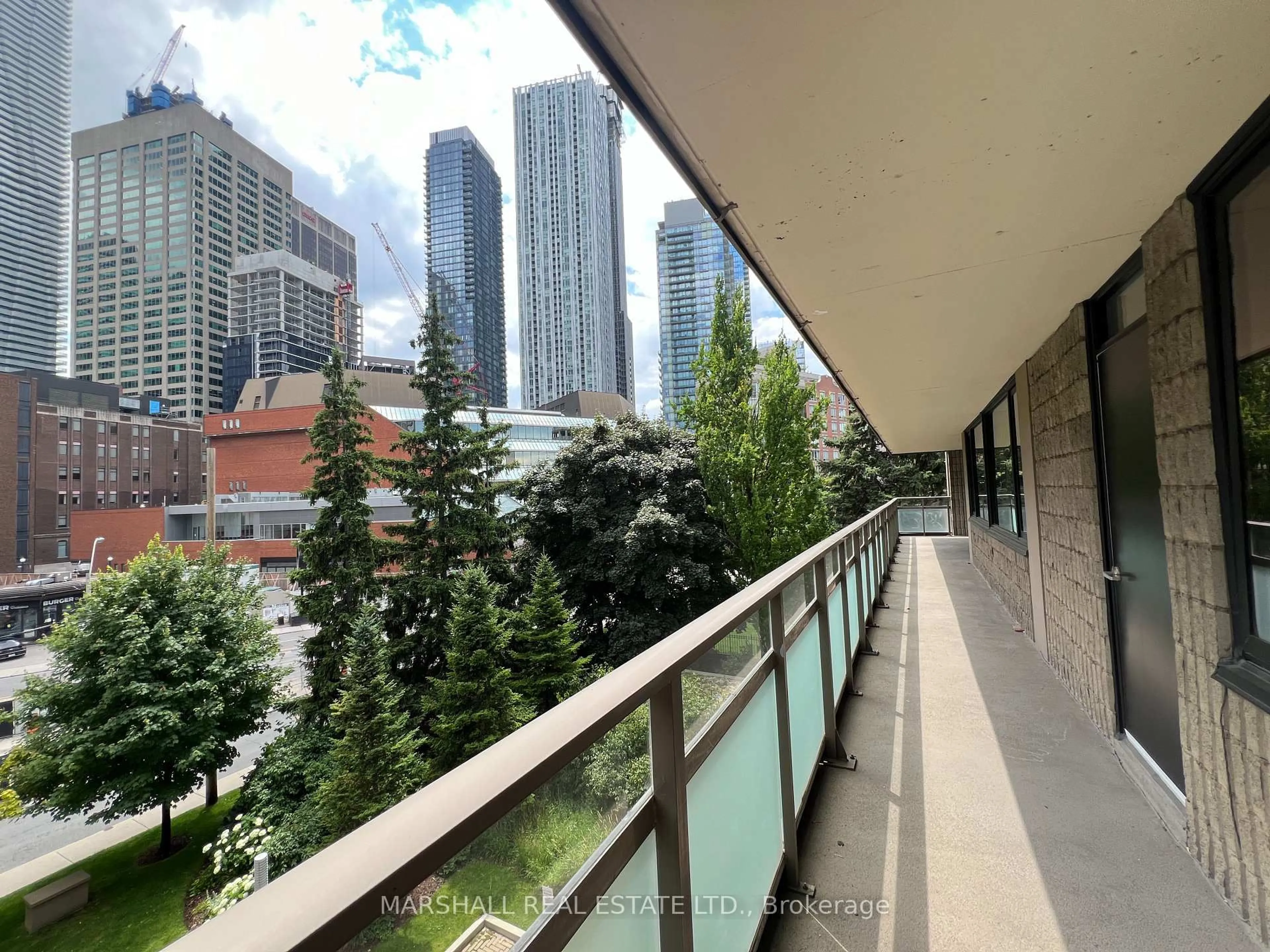 Balcony in the apartment, city buildings view from balcony for 66 Collier St #4A, Toronto Ontario M4W 1L9