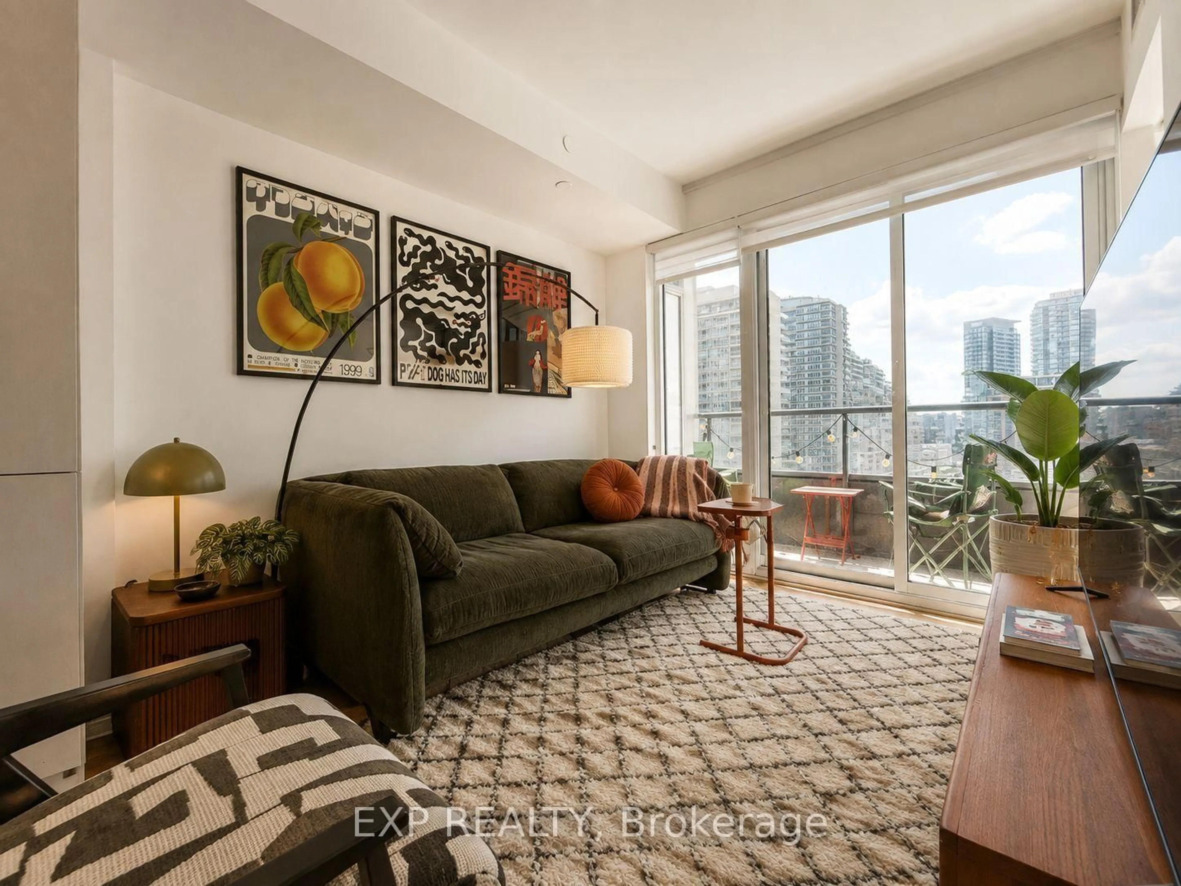 Living room with furniture, carpet floor for 19 Western Battery Rd #811, Toronto Ontario M6K 3S4
