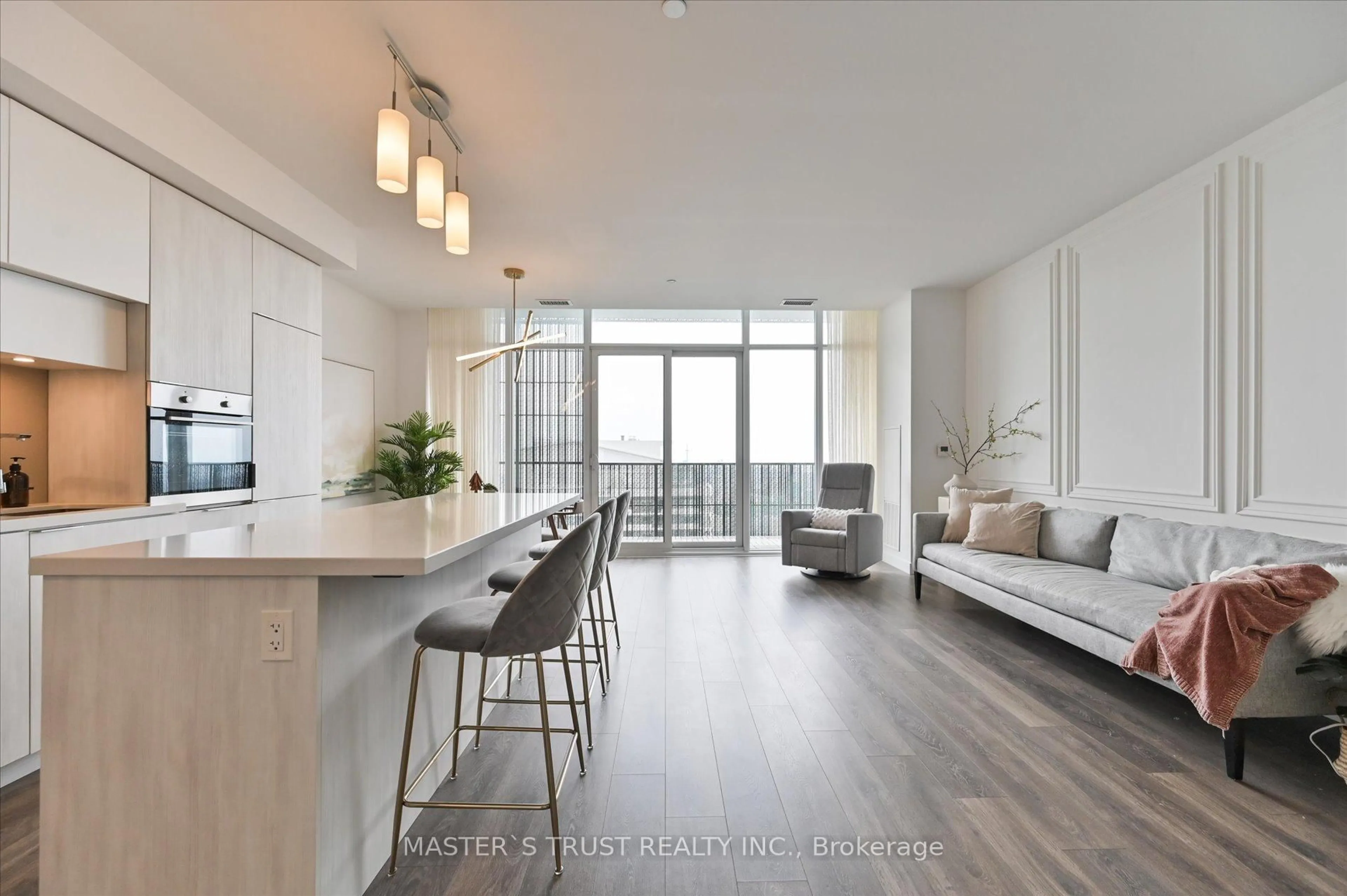 Open concept kitchen, wood/laminate floor for 8 Eglinton Ave #Ph 5801, Toronto Ontario M4P 0C1