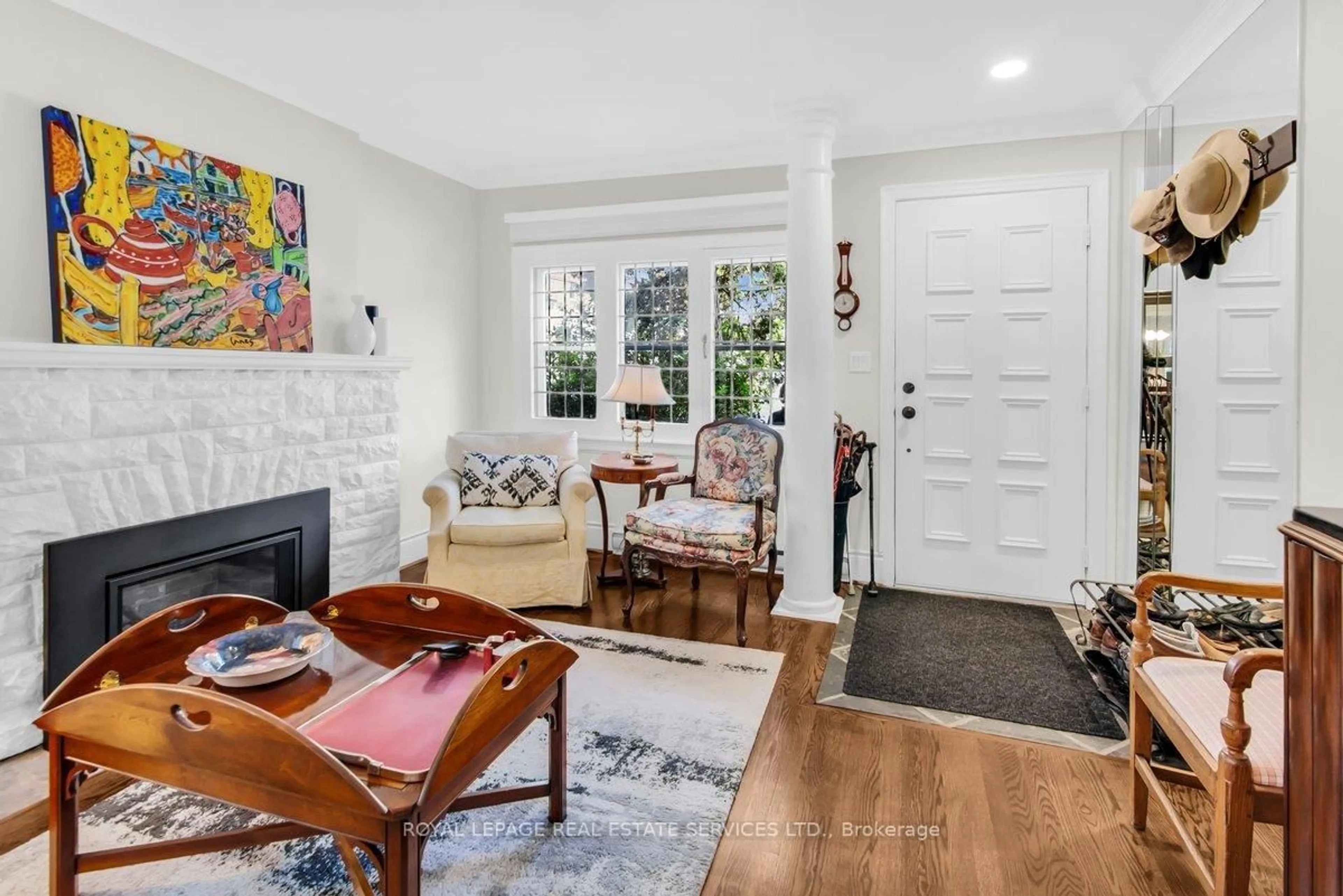 Living room with furniture, ceramic/tile floor for 47 Coulson Ave, Toronto Ontario M4V 1Y3