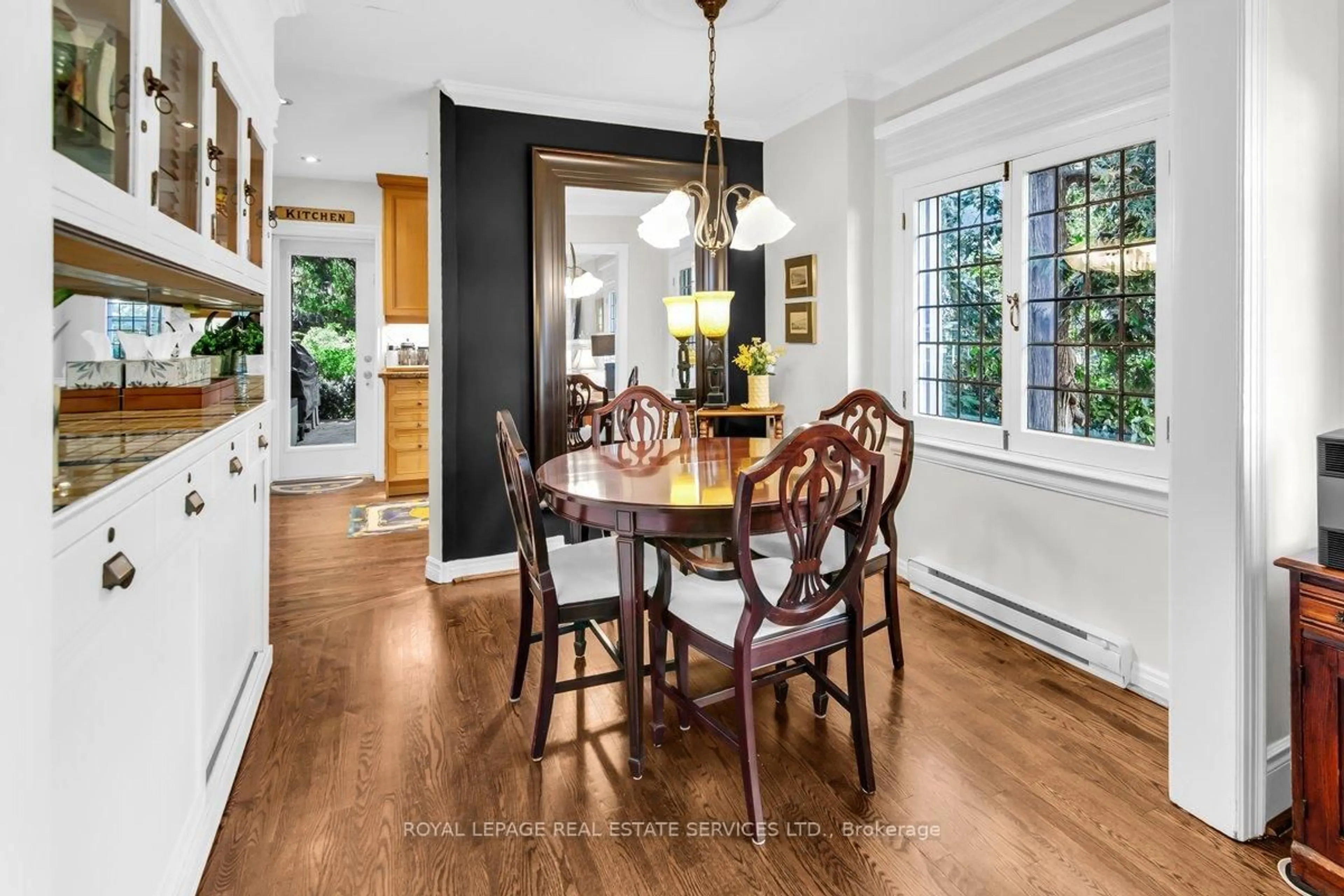 Dining room, wood/laminate floor for 47 Coulson Ave, Toronto Ontario M4V 1Y3