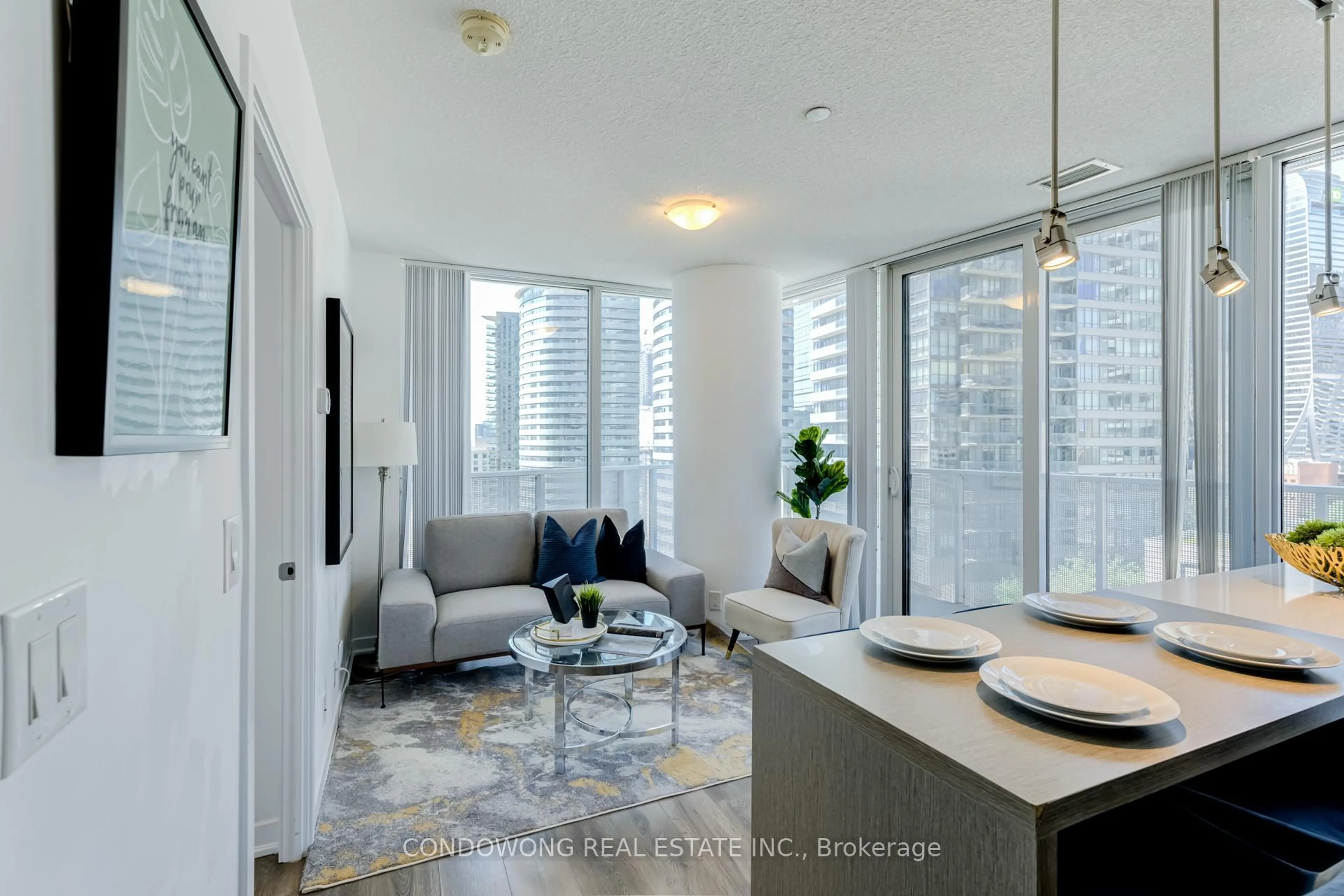 Living room with furniture, unknown for 100 Harbour St #1702, Toronto Ontario M5J 0B5