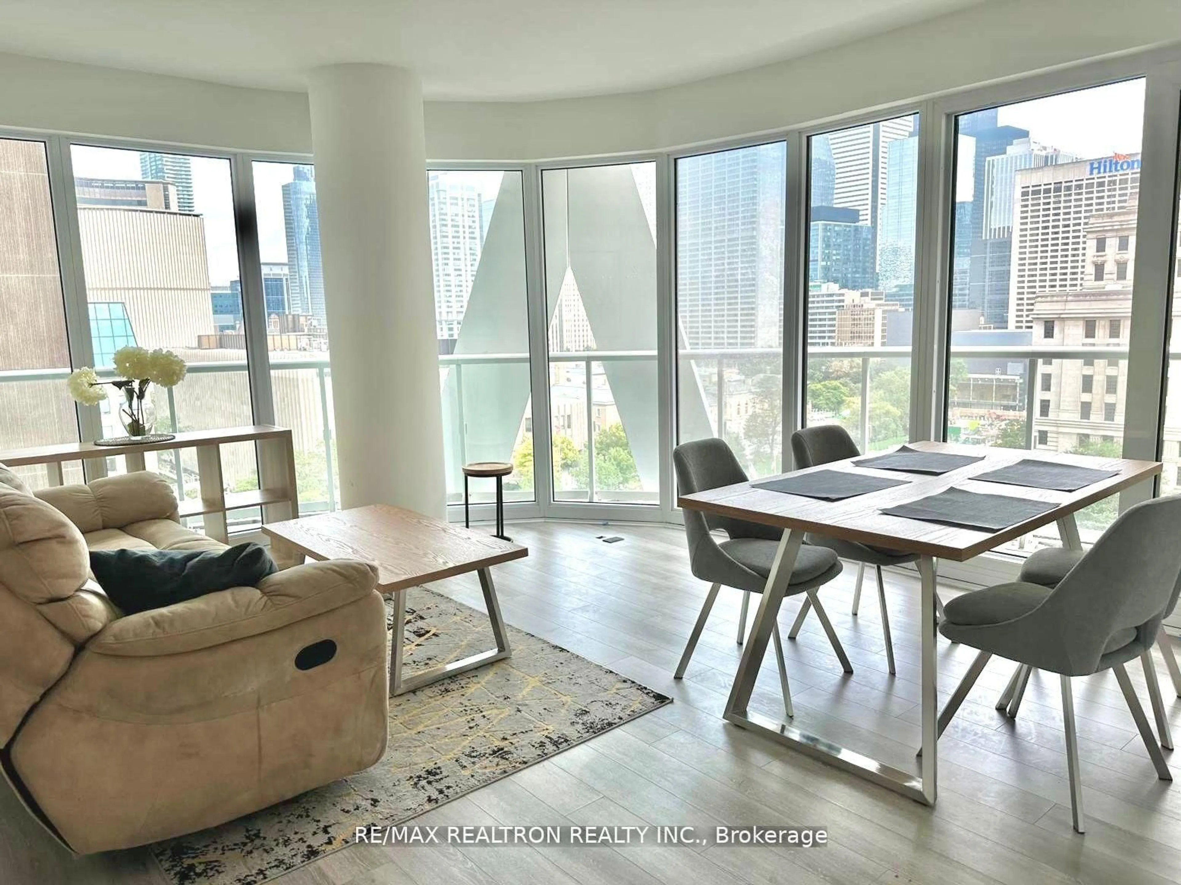Living room with furniture, unknown for 230 Simcoe St #926, Toronto Ontario M5T 1T4