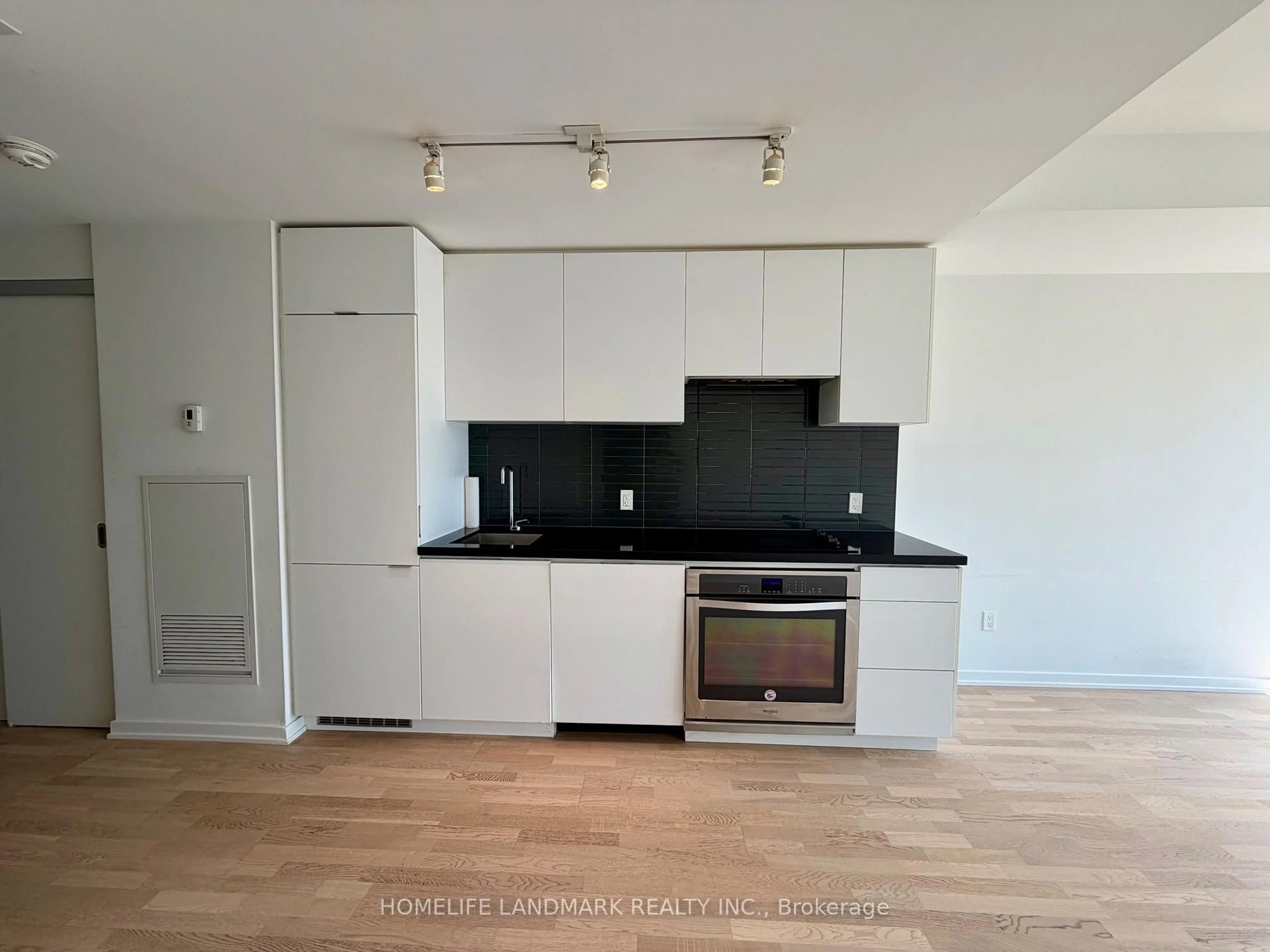Standard kitchen, wood/laminate floor for 60 Colborne St #1703, Toronto Ontario M5E 0B7