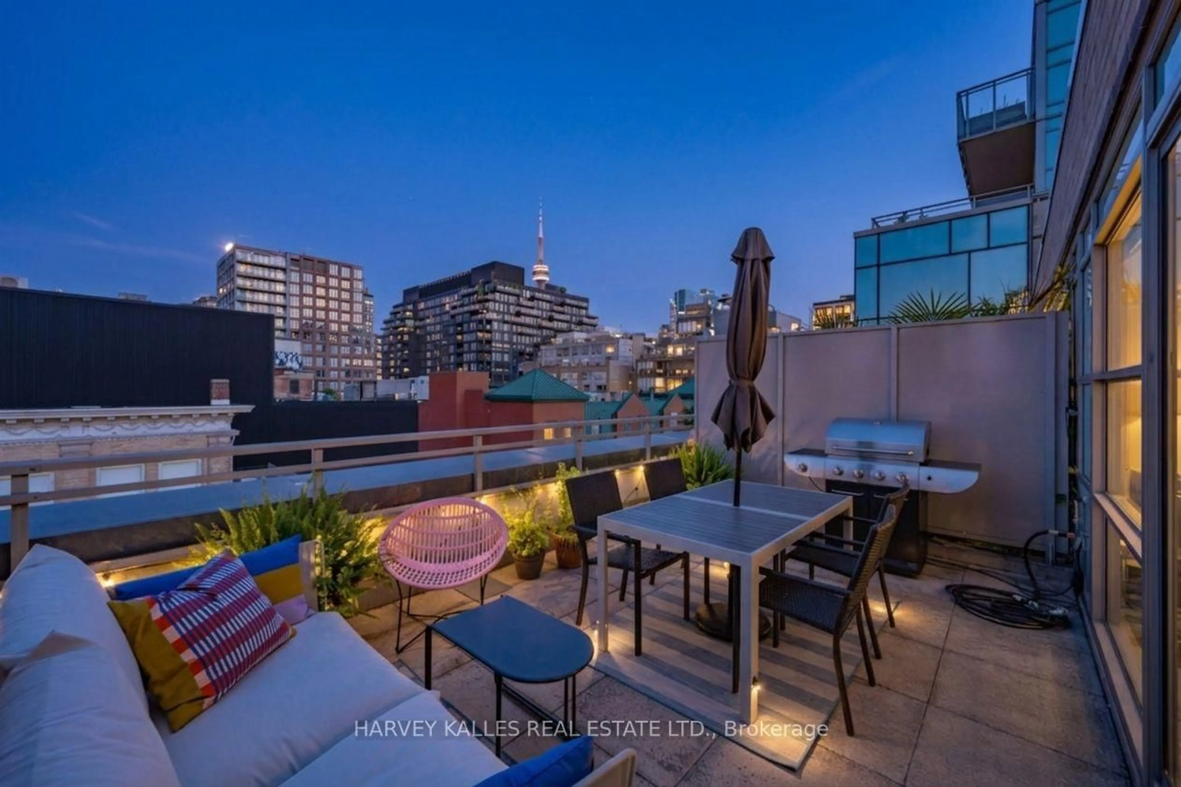 Patio, city buildings view from balcony for 156 Portland St #309, Toronto Ontario M5V 0G1