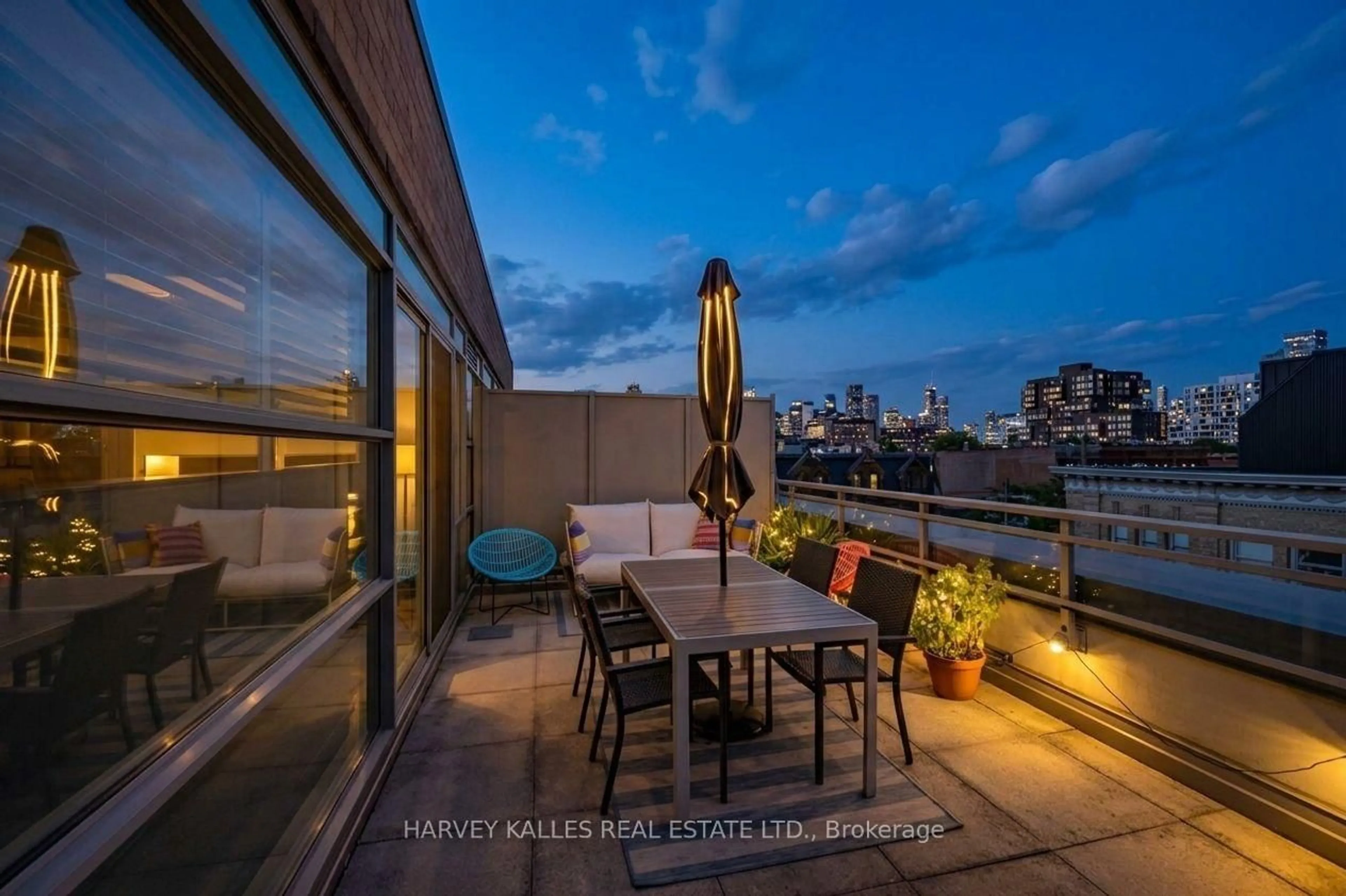 Patio, city buildings view from balcony for 156 Portland St #309, Toronto Ontario M5V 0G1
