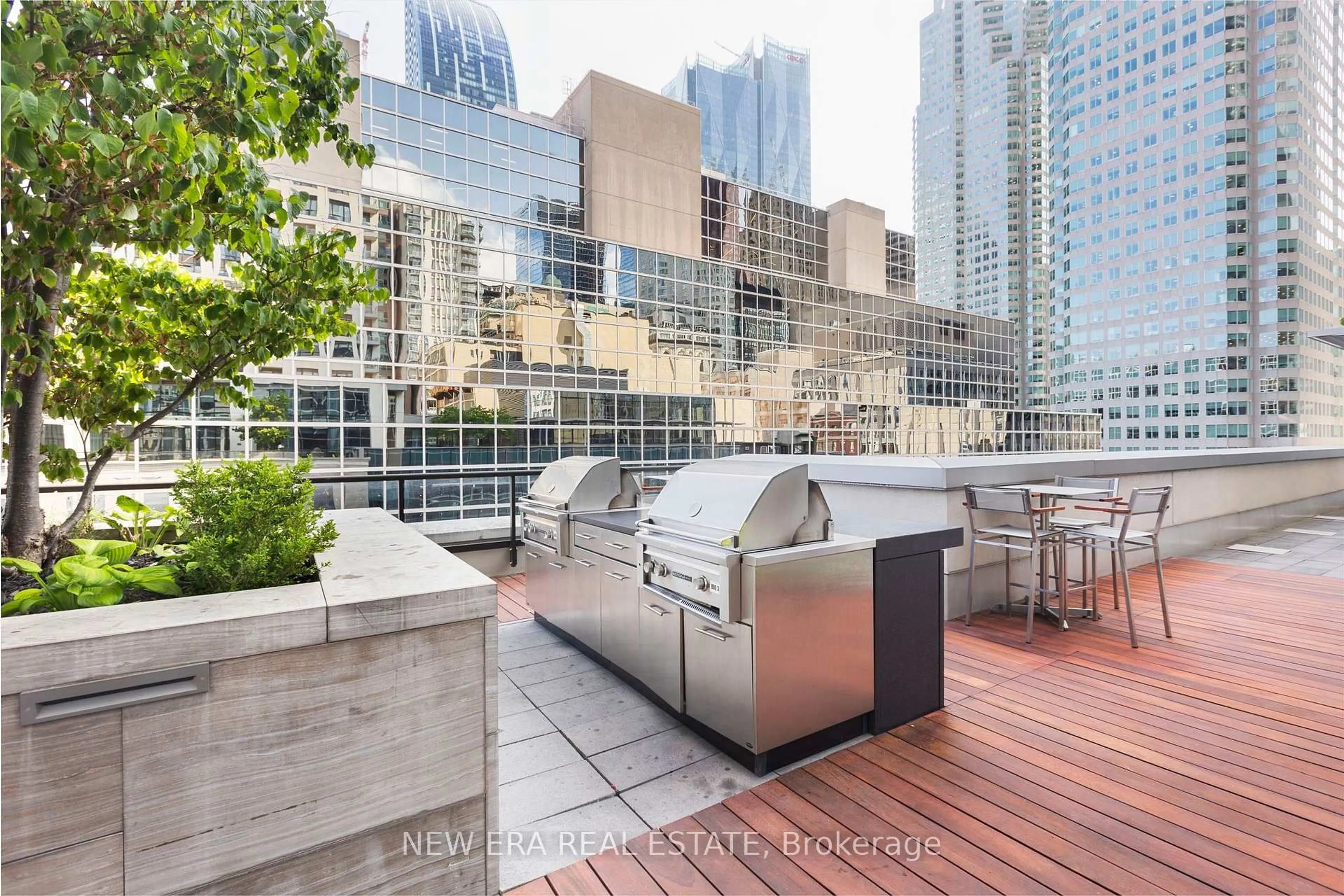 Patio, city buildings view from balcony for 88 Scott St #2106, Toronto Ontario M5E 0A9