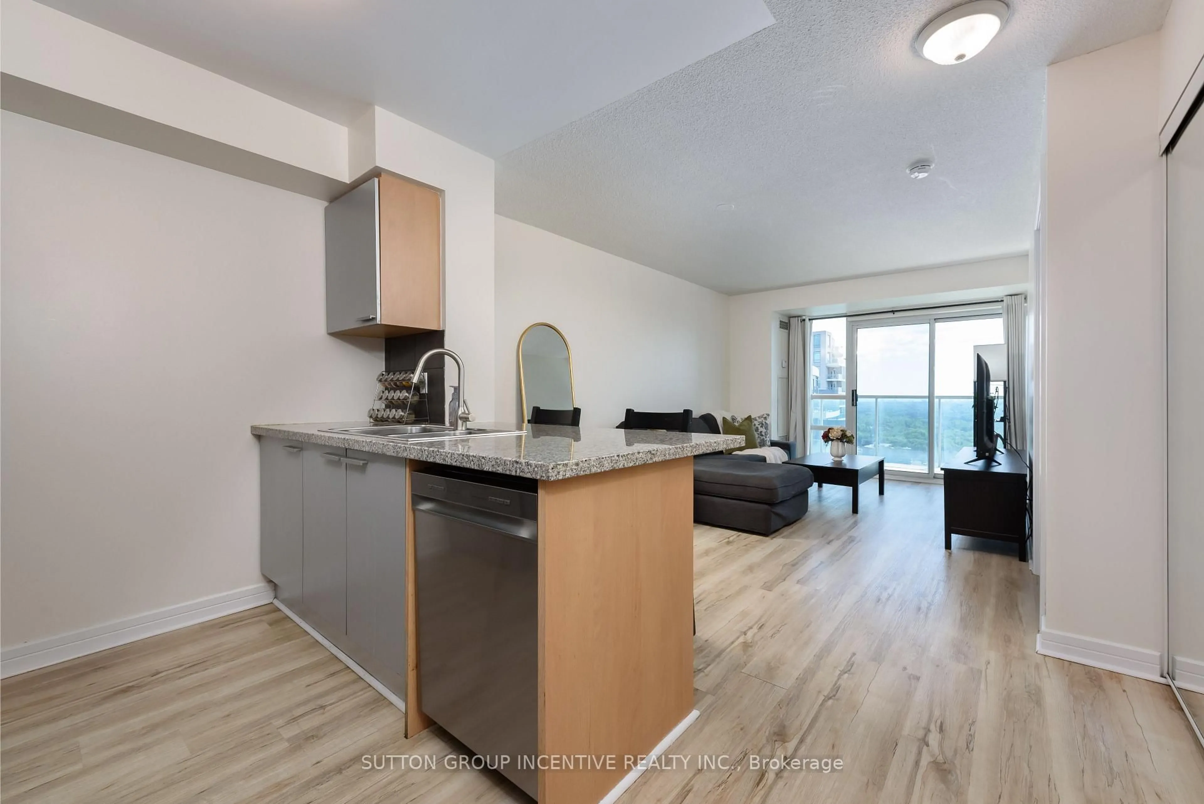 Open concept kitchen, wood/laminate floor for 18 Harrison Garden Blvd #2409, Toronto Ontario M2N 7J7