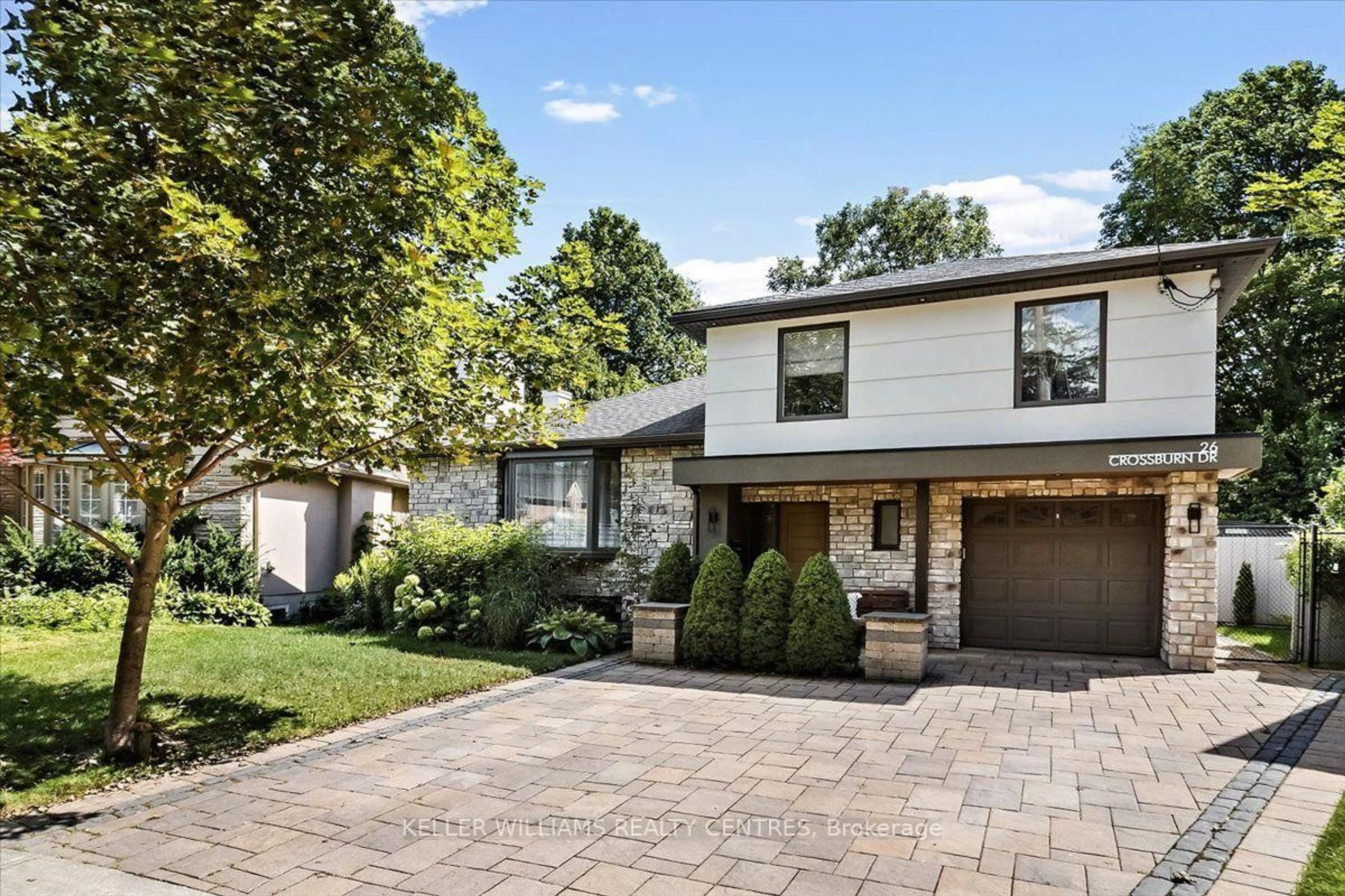 Home with brick exterior material, street for 26 Crossburn Dr, Toronto Ontario M3B 2Z2