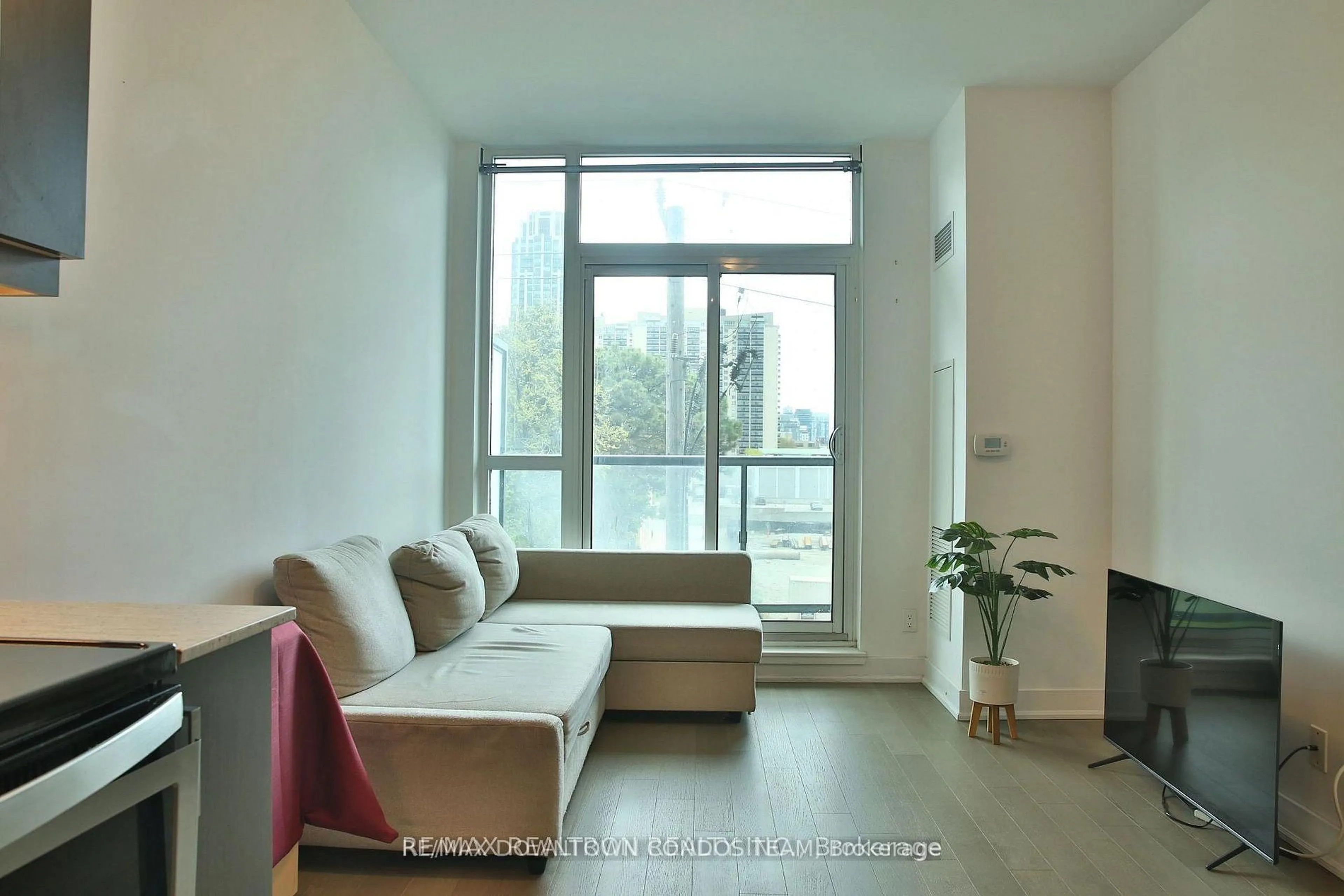 Living room with furniture, unknown for 1486 Bathurst St #303, Toronto Ontario M5P 3G9