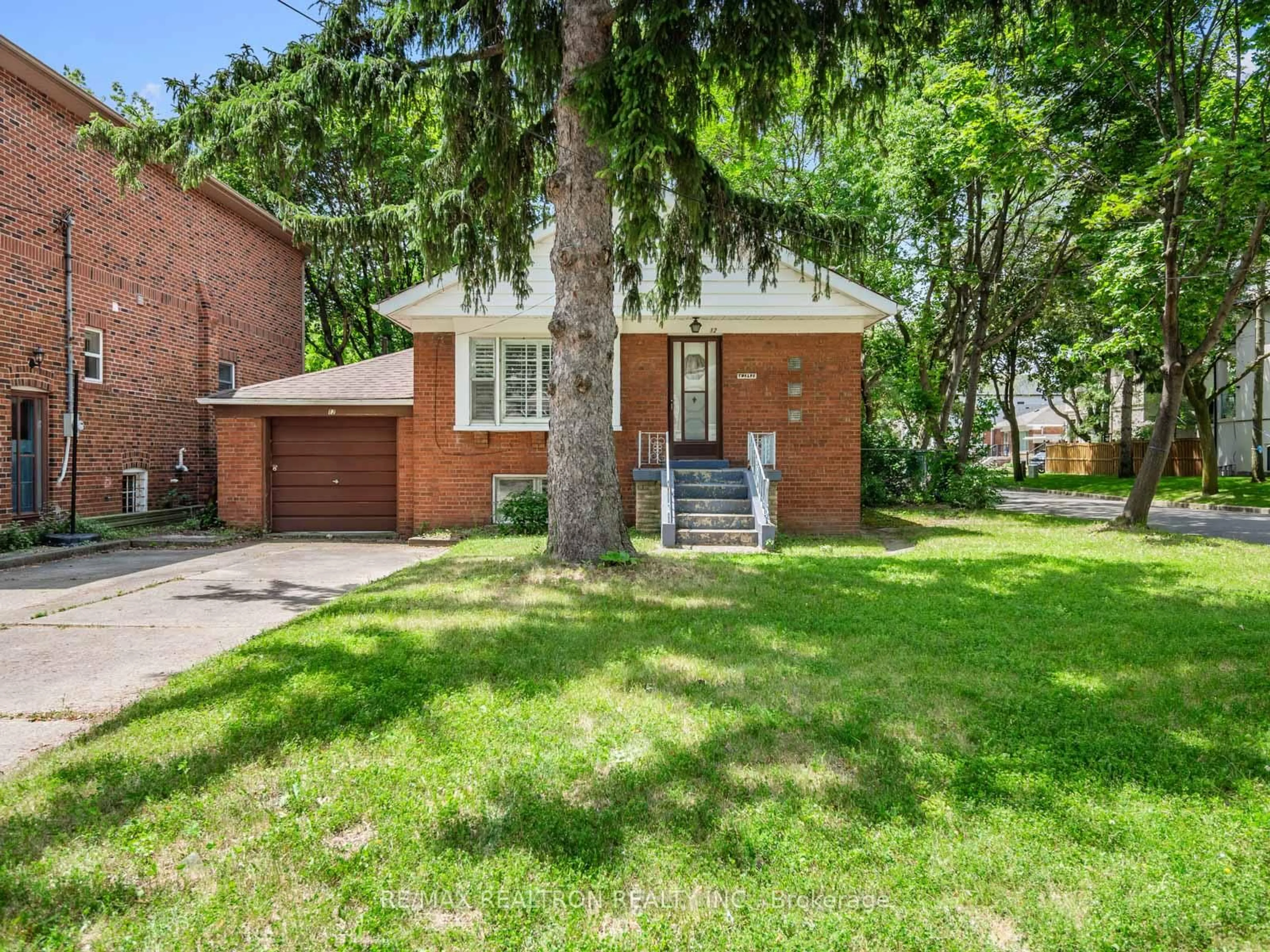 Home with brick exterior material, street for 12 Graymar Ave, Toronto Ontario M3H 3B4