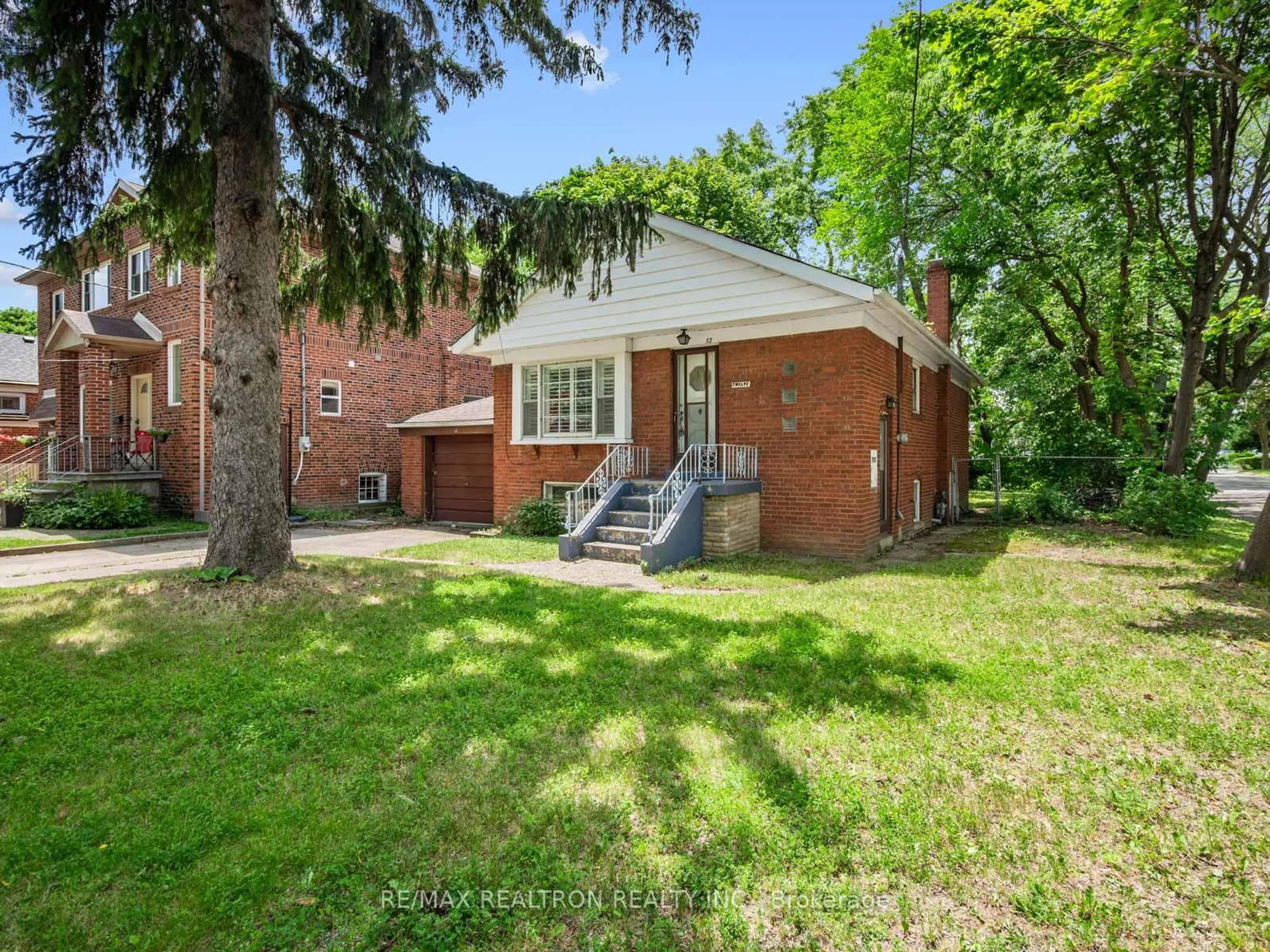 Home with brick exterior material, street for 12 Graymar Ave, Toronto Ontario M3H 3B4