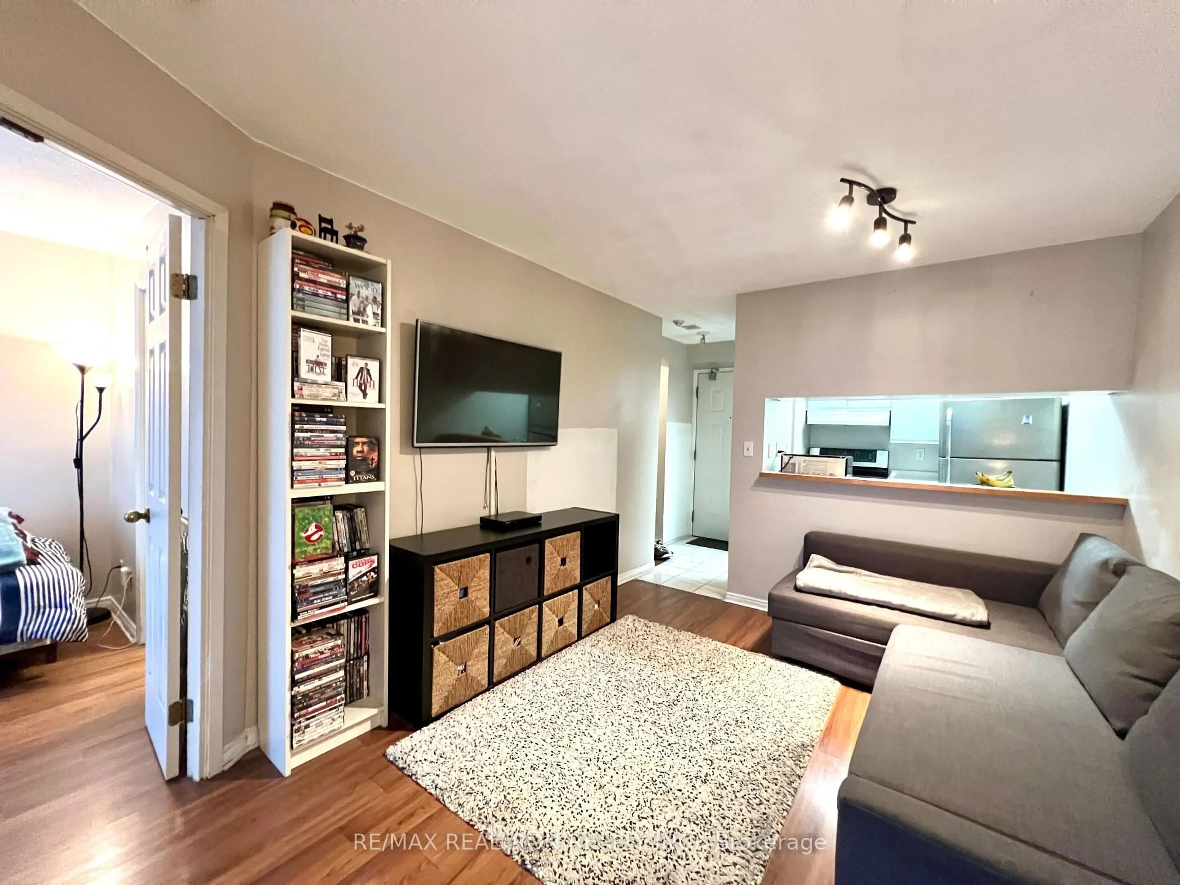 Living room with furniture, wood/laminate floor for 222 The Esplanade #512, Toronto Ontario M5A 4M8