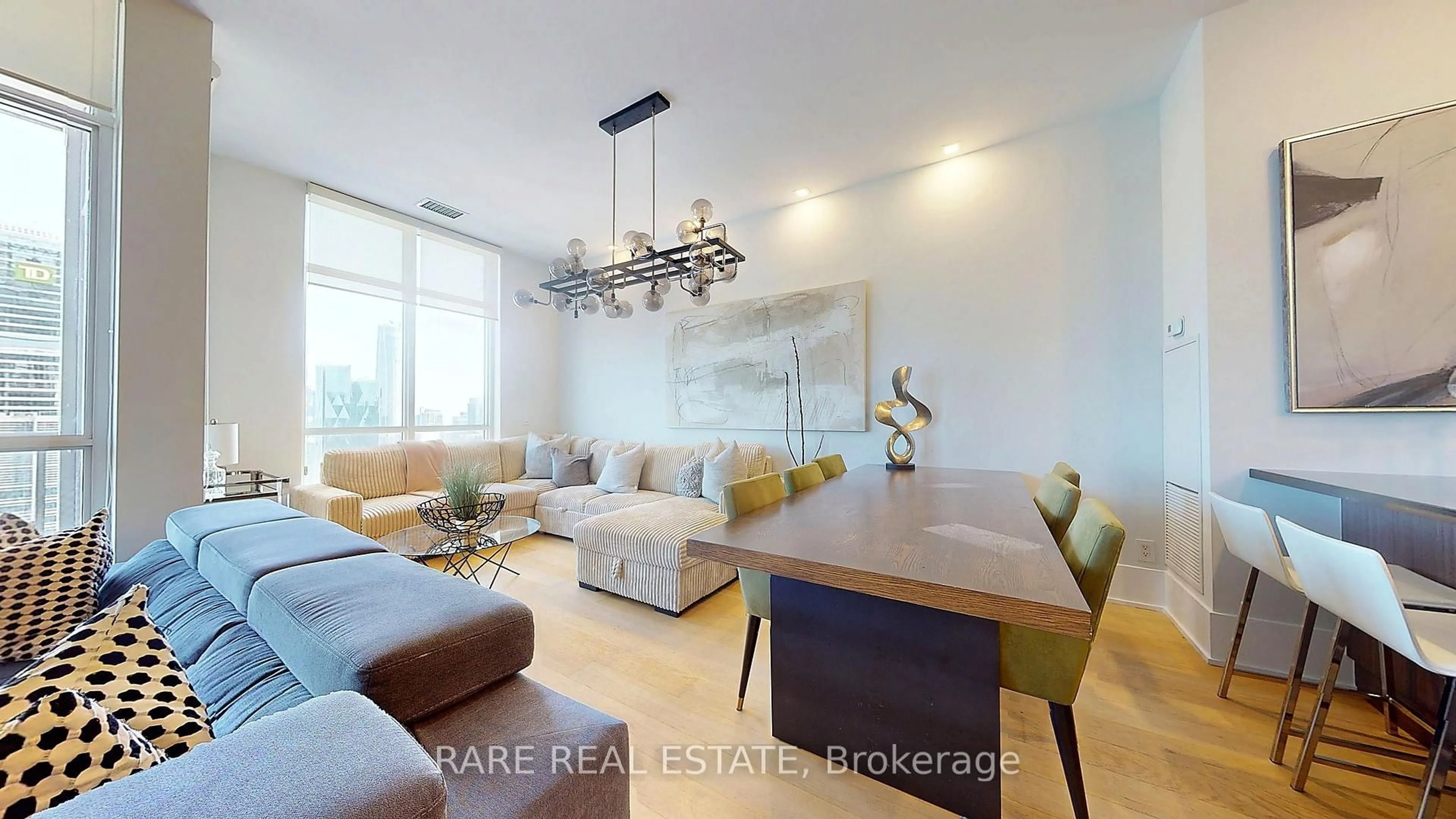 Living room with furniture, wood/laminate floor for 300 Front St #4902, Toronto Ontario M5V 0E9