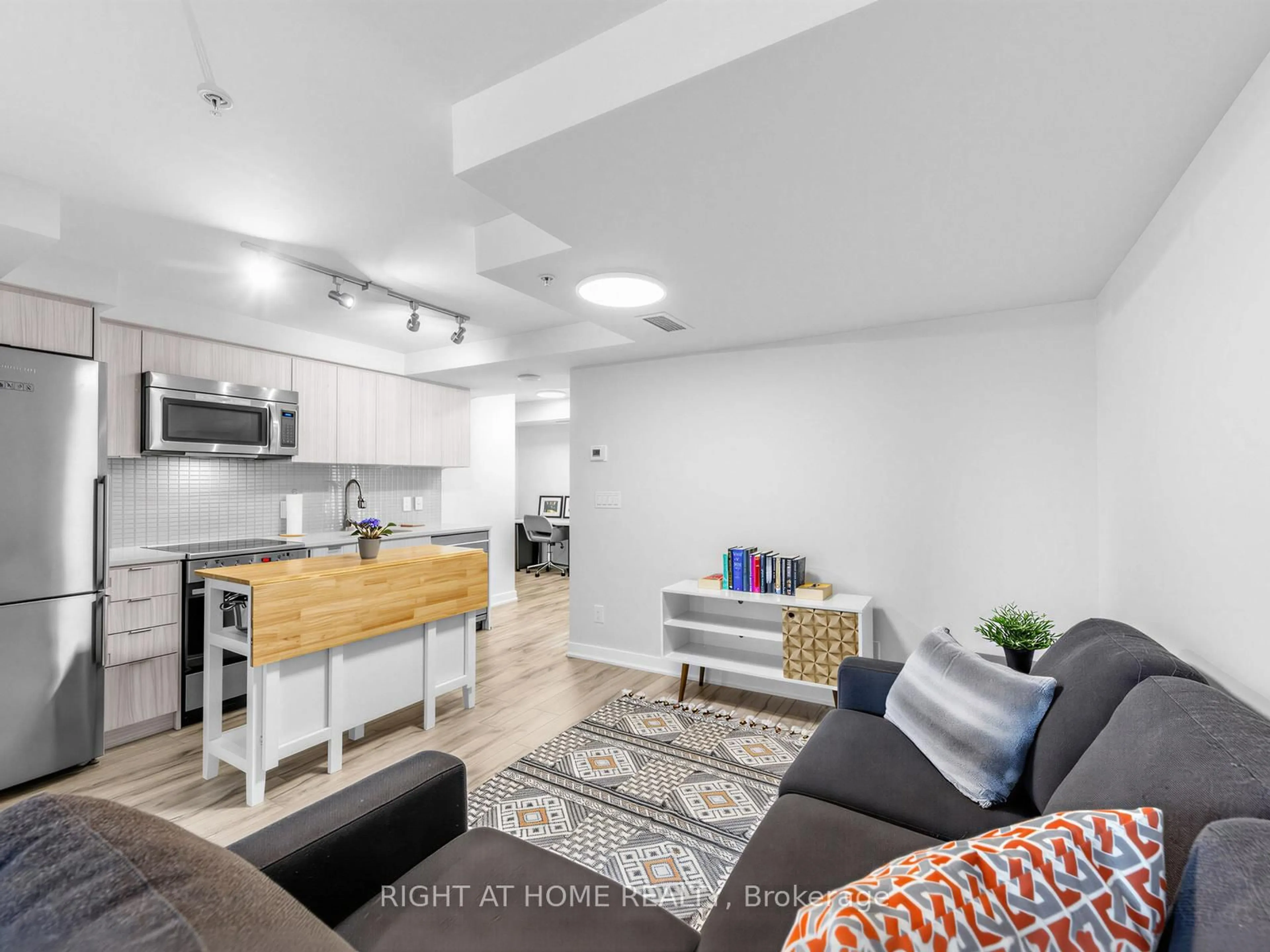 Living room with furniture, unknown for 295 Adelaide St #1210, Toronto Ontario M5V 0L4