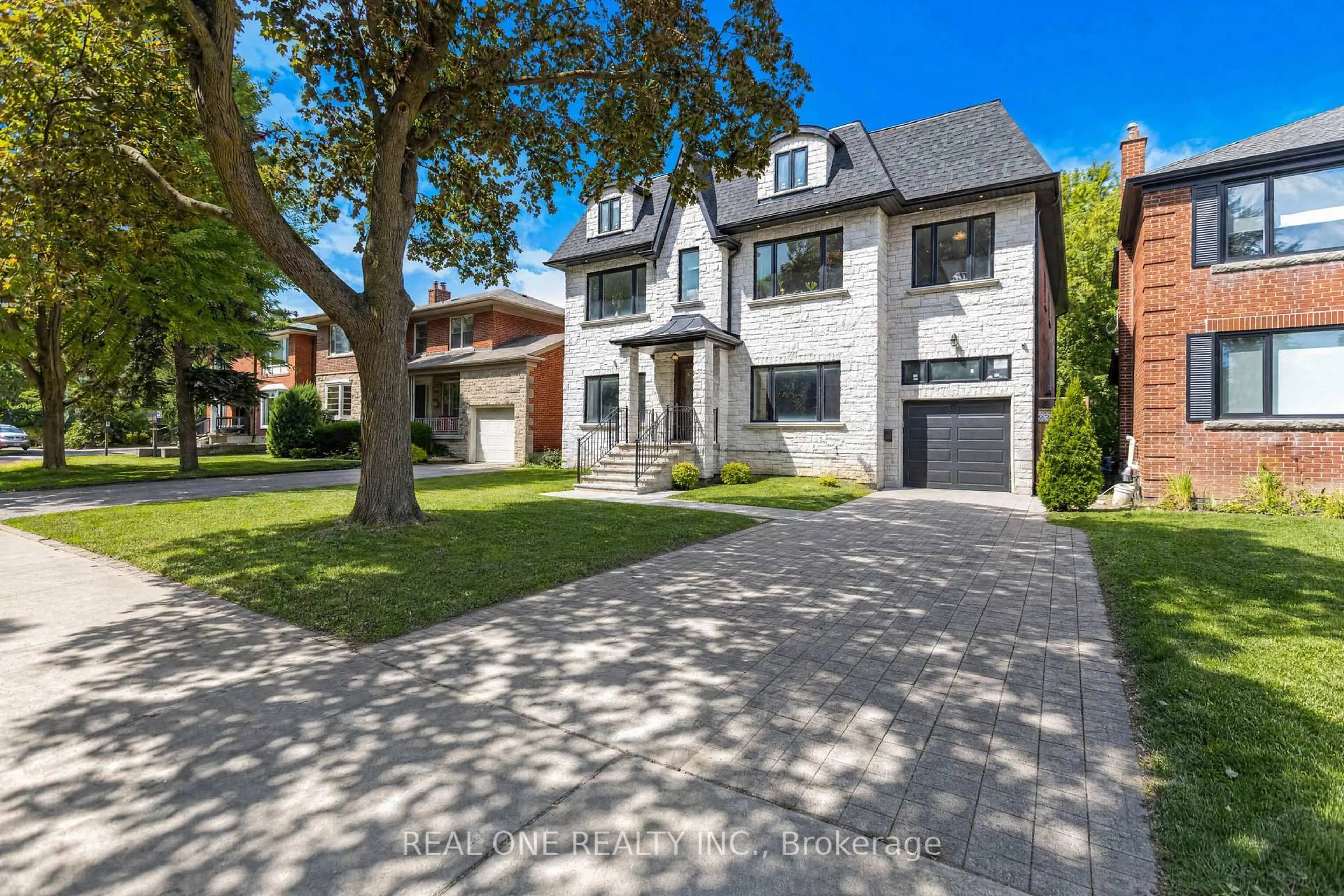 Home with brick exterior material, street for 100 Ridelle Ave, Toronto Ontario M6B 1J6