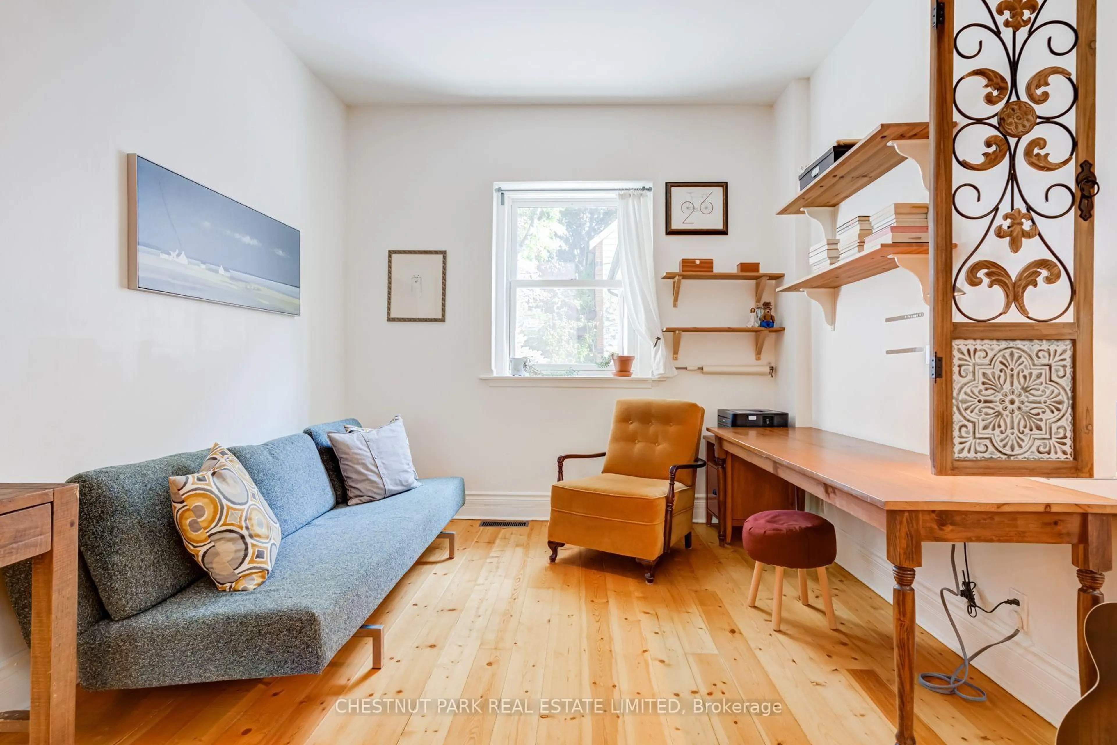 Living room with furniture, wood/laminate floor for 10 Sackville Pl, Toronto Ontario M4X 1A4