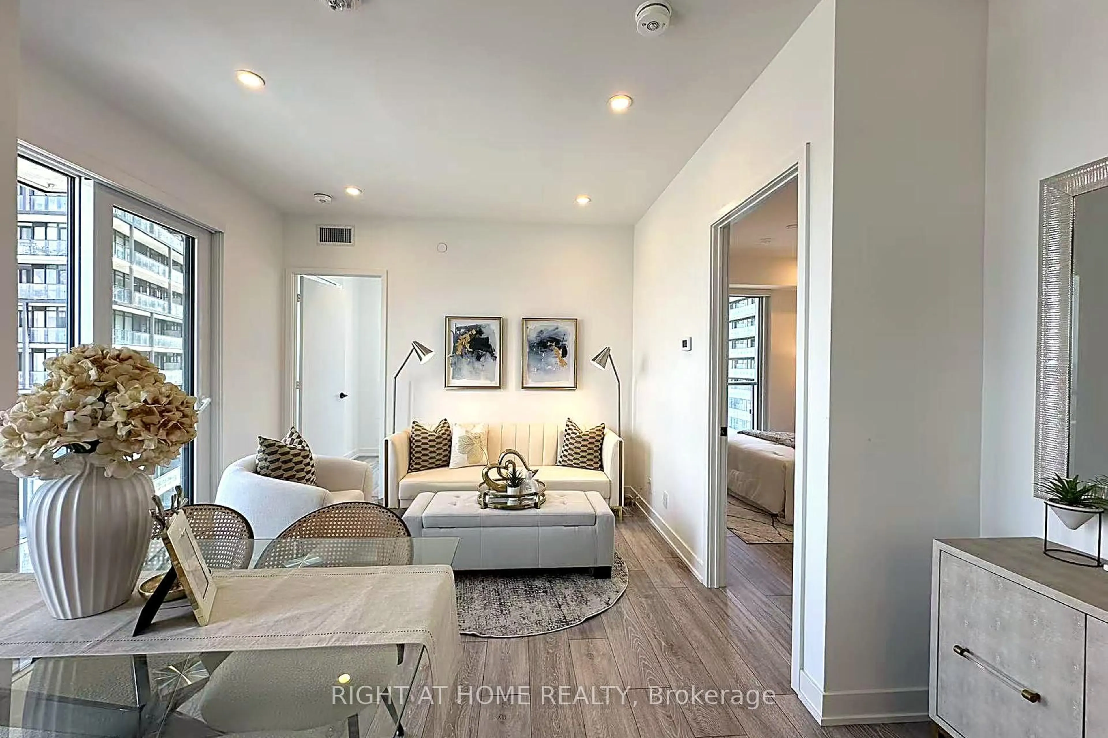 Living room with furniture, wood/laminate floor for 108 Peter St #3302, Toronto Ontario M5V 0W2