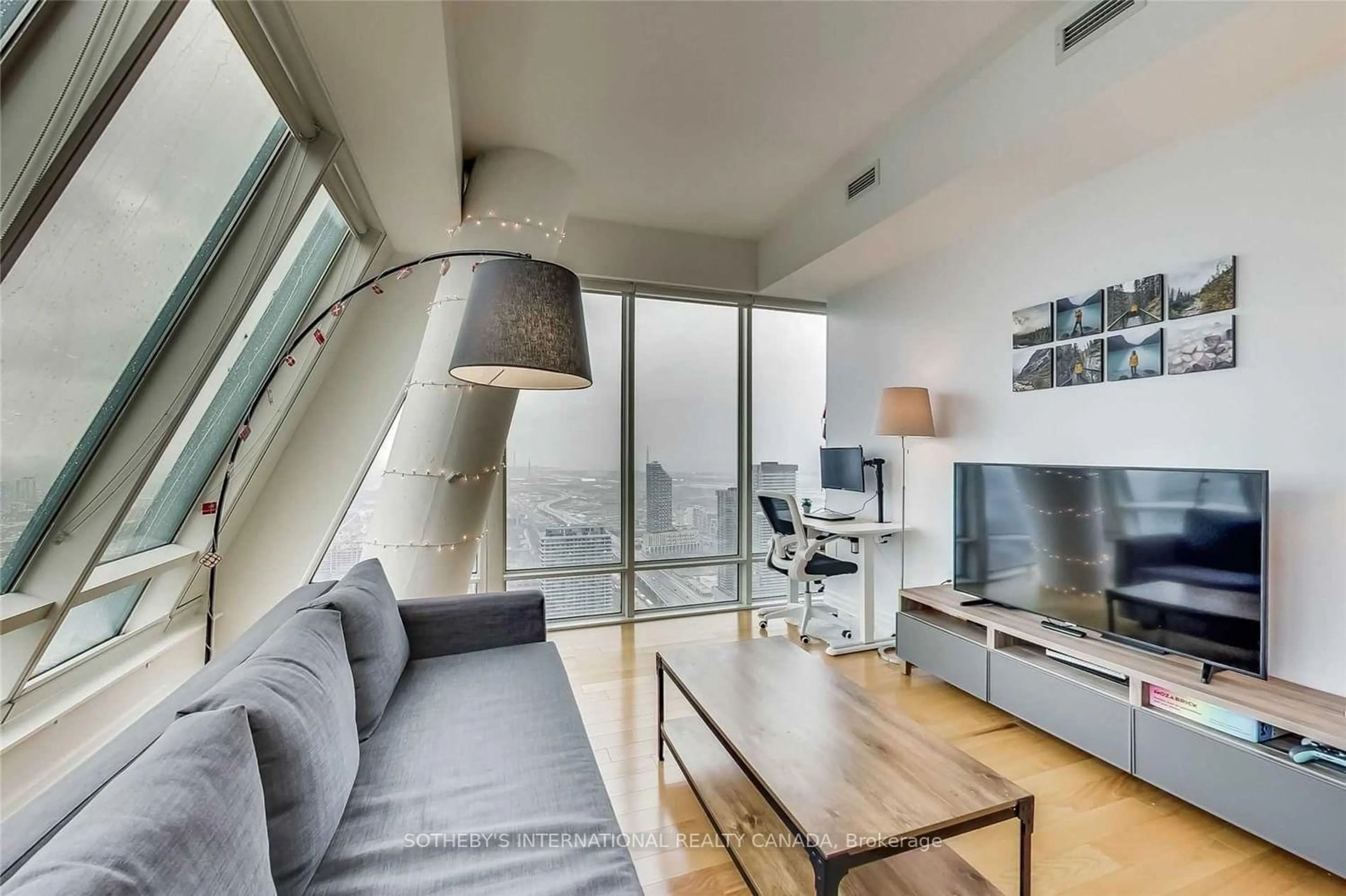 Living room with furniture, unknown for 8 The Esplanade #5505, Toronto Ontario M5E 0A6