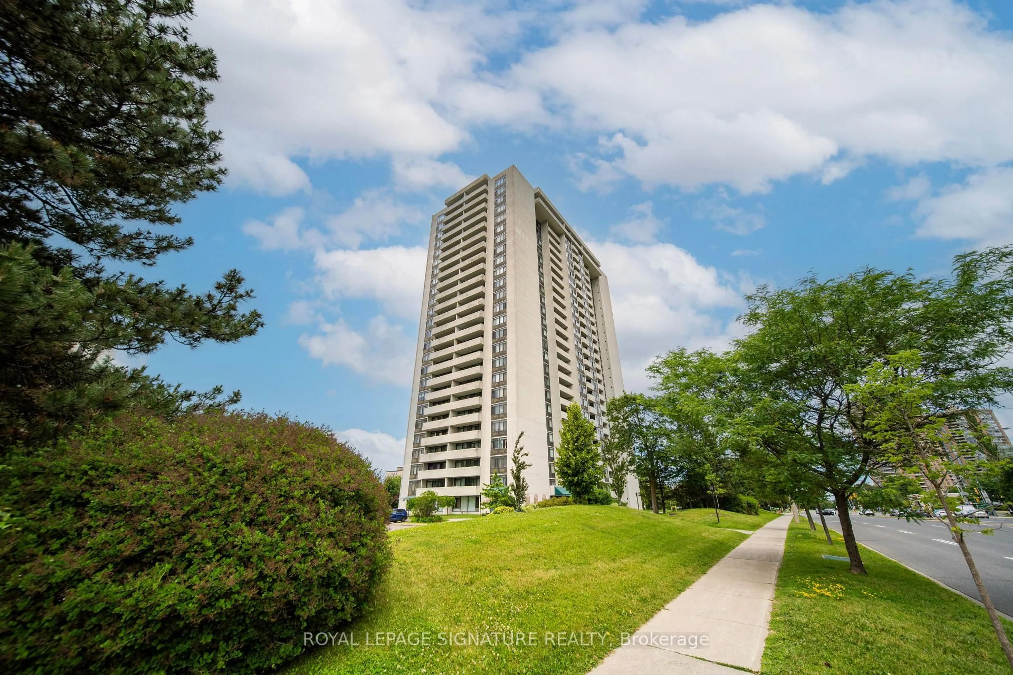 A pic from outside/outdoor area/front of a property/back of a property/a pic from drone, building for 3300 Don Mills Rd #1506, Toronto Ontario M2J 4X7