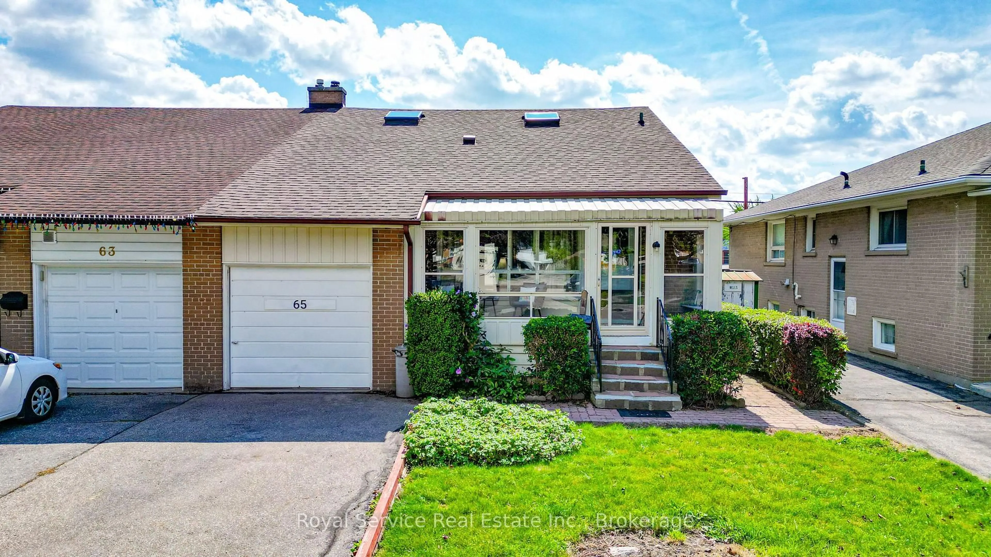 Home with vinyl exterior material, street for 65 Combermere Dr, Toronto Ontario M3A 2W4