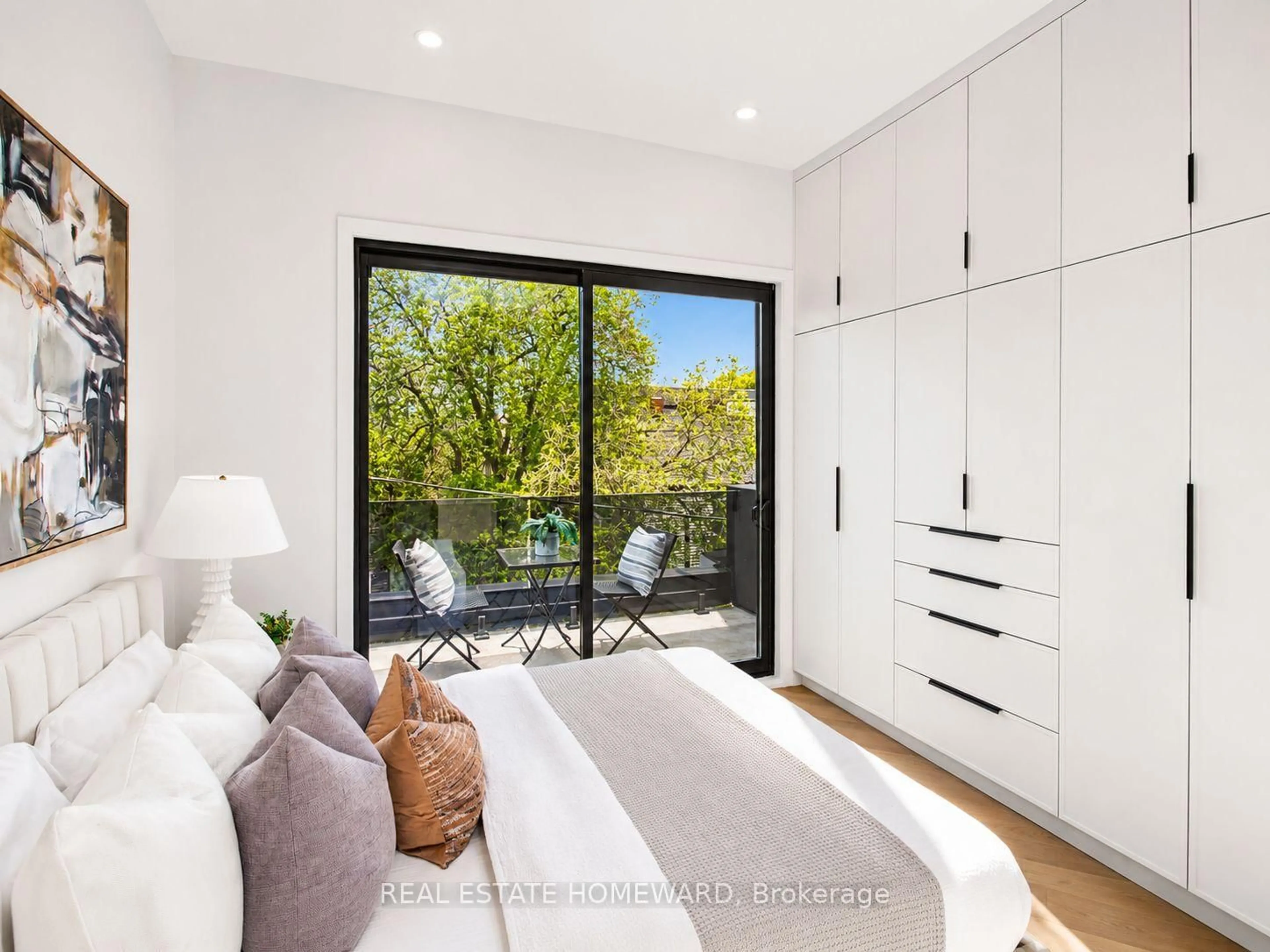 Bedroom with bed, wood/laminate floor for 3 Rebecca St, Toronto Ontario M6J 1K8