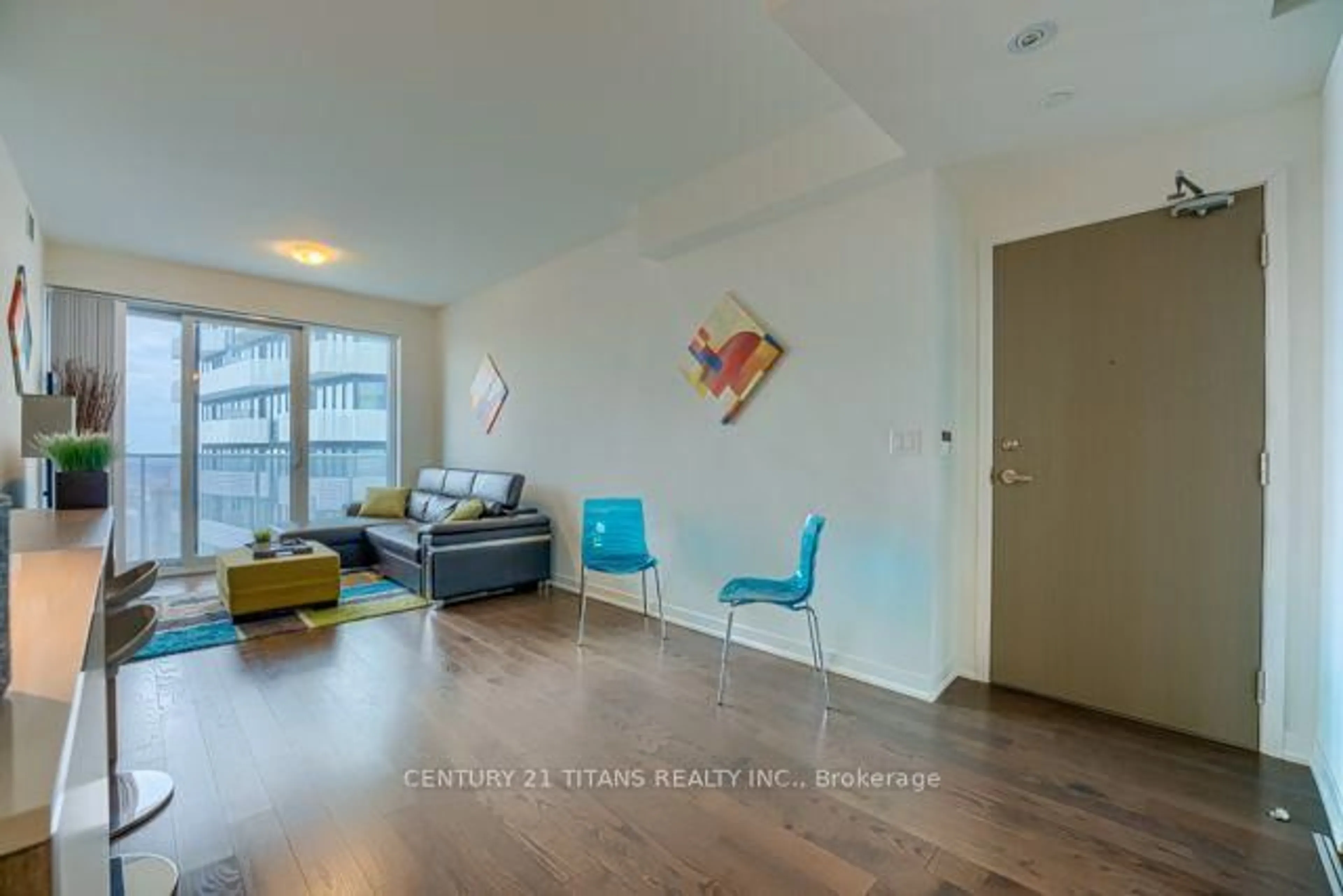 Living room with furniture, wood/laminate floor for 100 Harbour St #6606, Toronto Ontario M5J 2T5